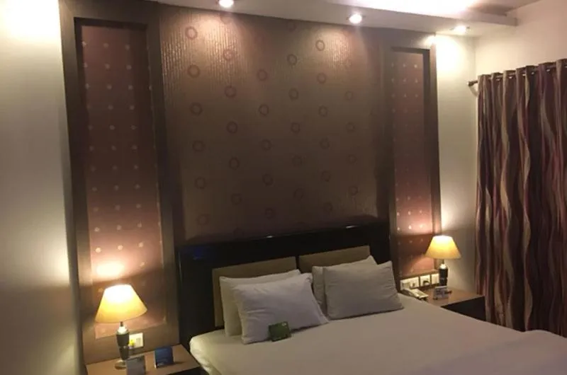 Bed in Shiva Oasis Resort