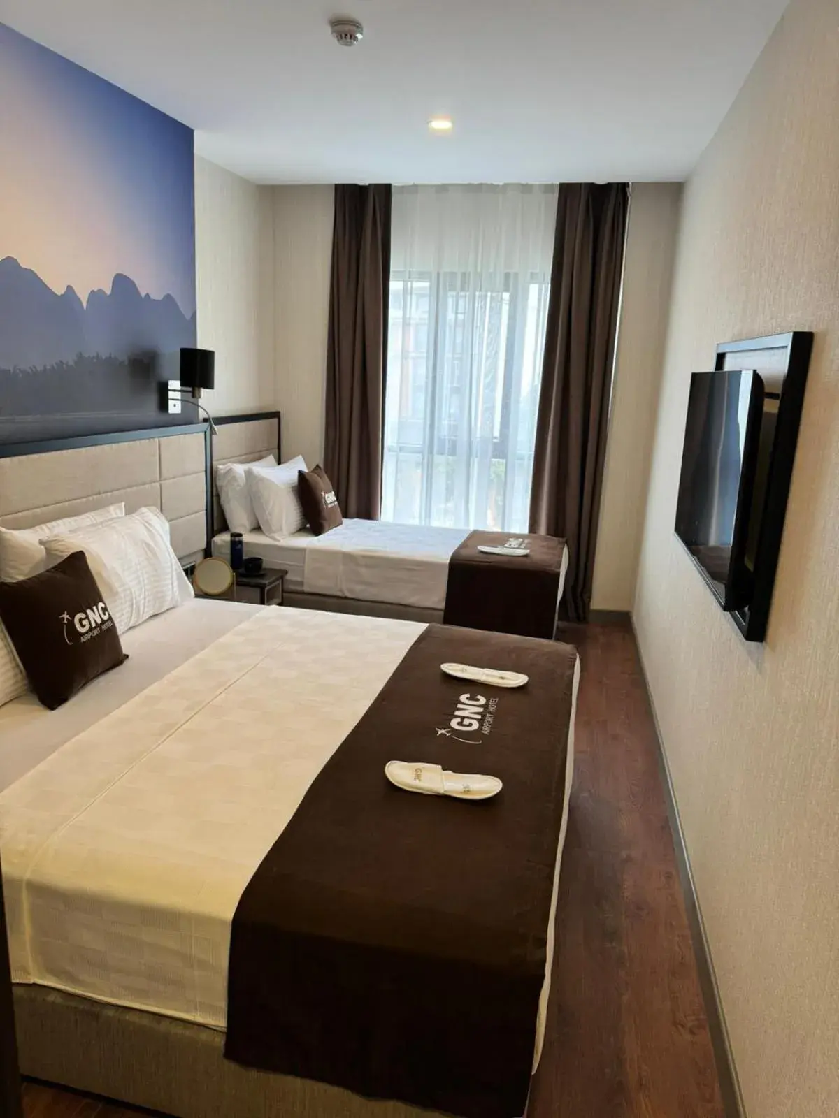 Deluxe Triple Room in Gnc Airport Hotel Deluxe Triple Room in Gnc Airport Hotel