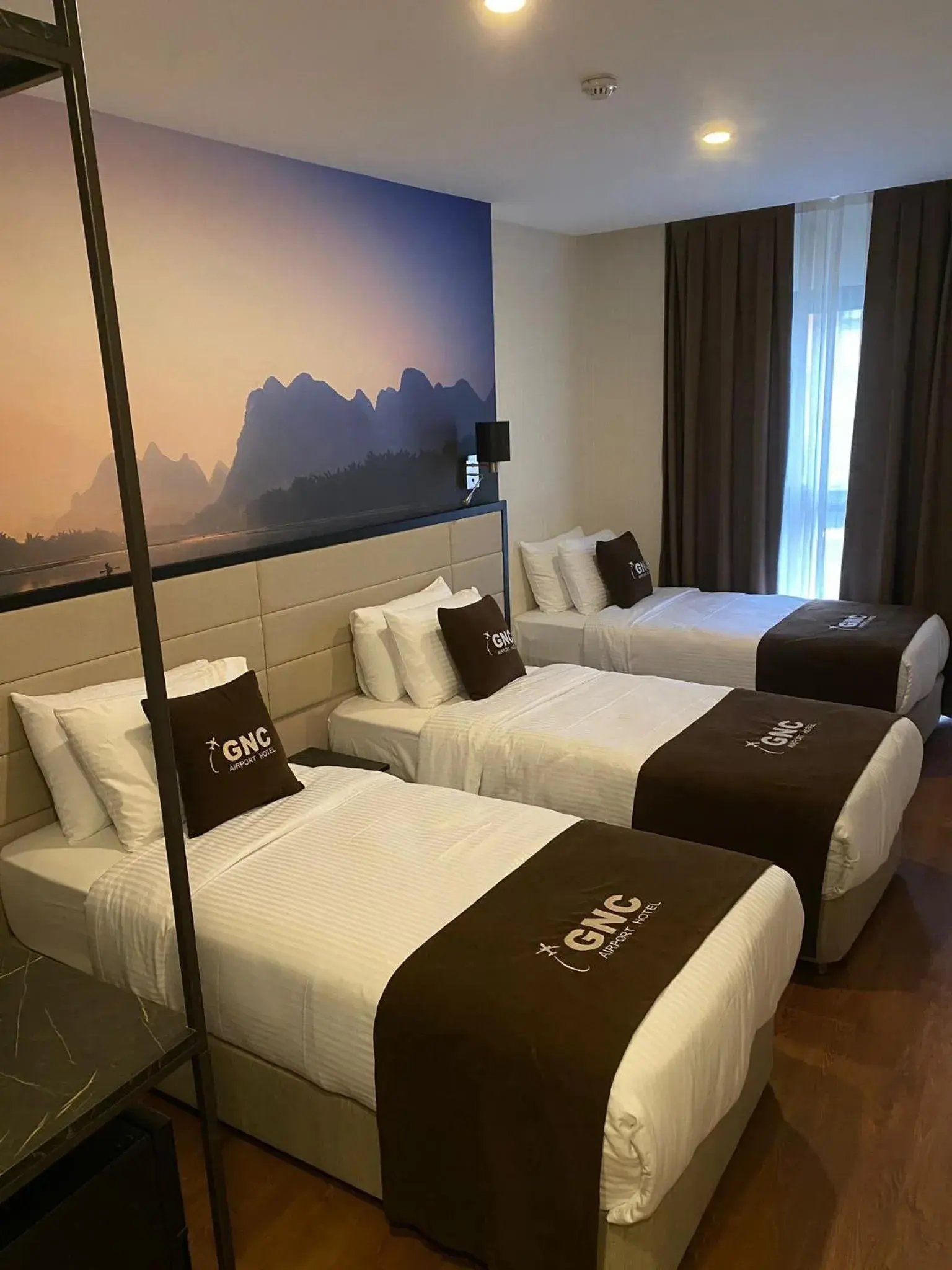 Deluxe Triple Room in Gnc Airport Hotel Deluxe Triple Room in Gnc Airport Hotel