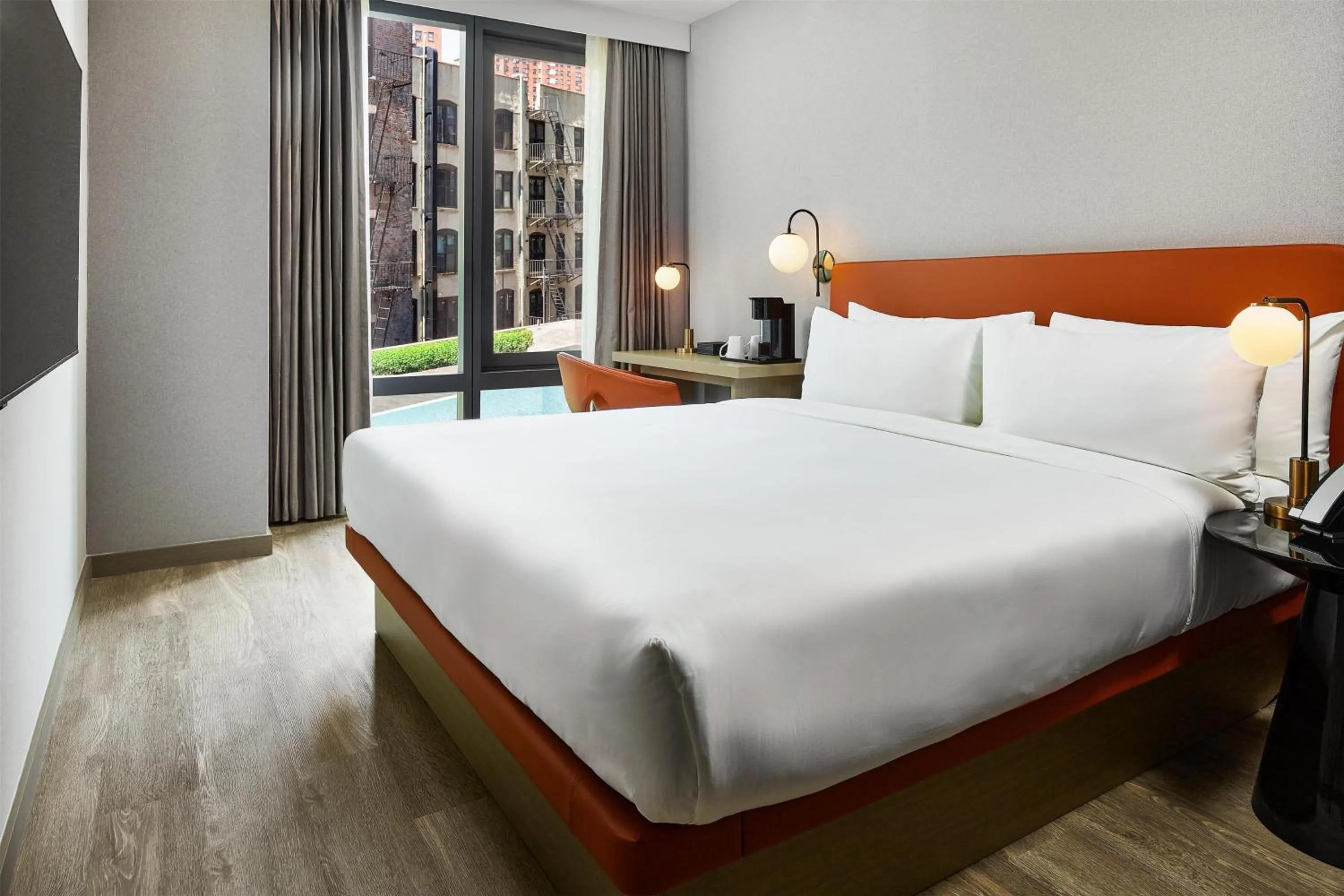 Bed in The George Manhattan, Tapestry Collection By Hilton