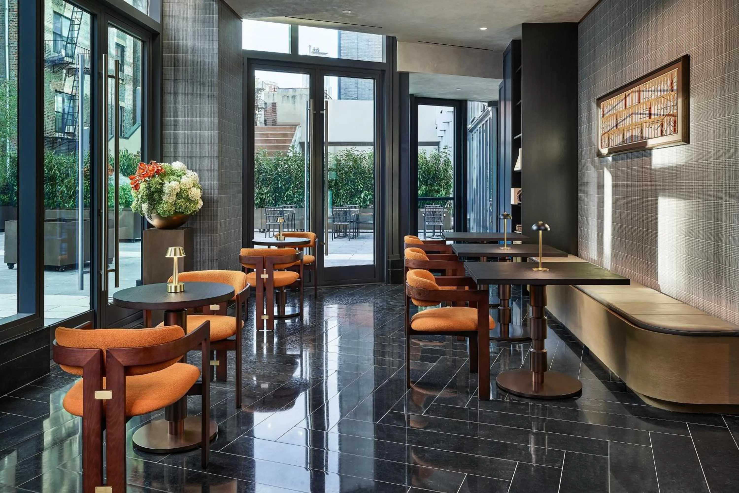 Communal lounge/ TV room in The George Manhattan, Tapestry Collection By Hilton