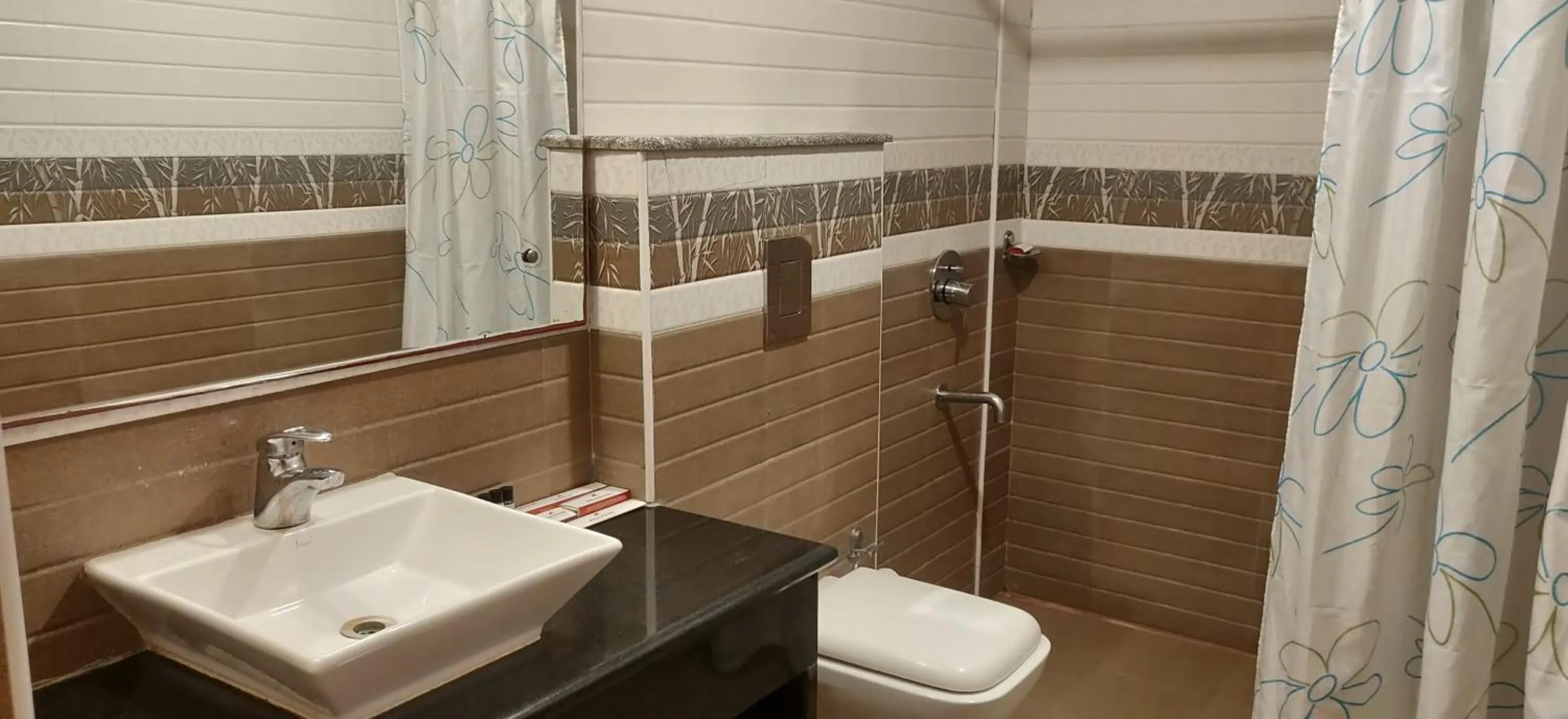 Bathroom in Mrugavani Resort & Spa