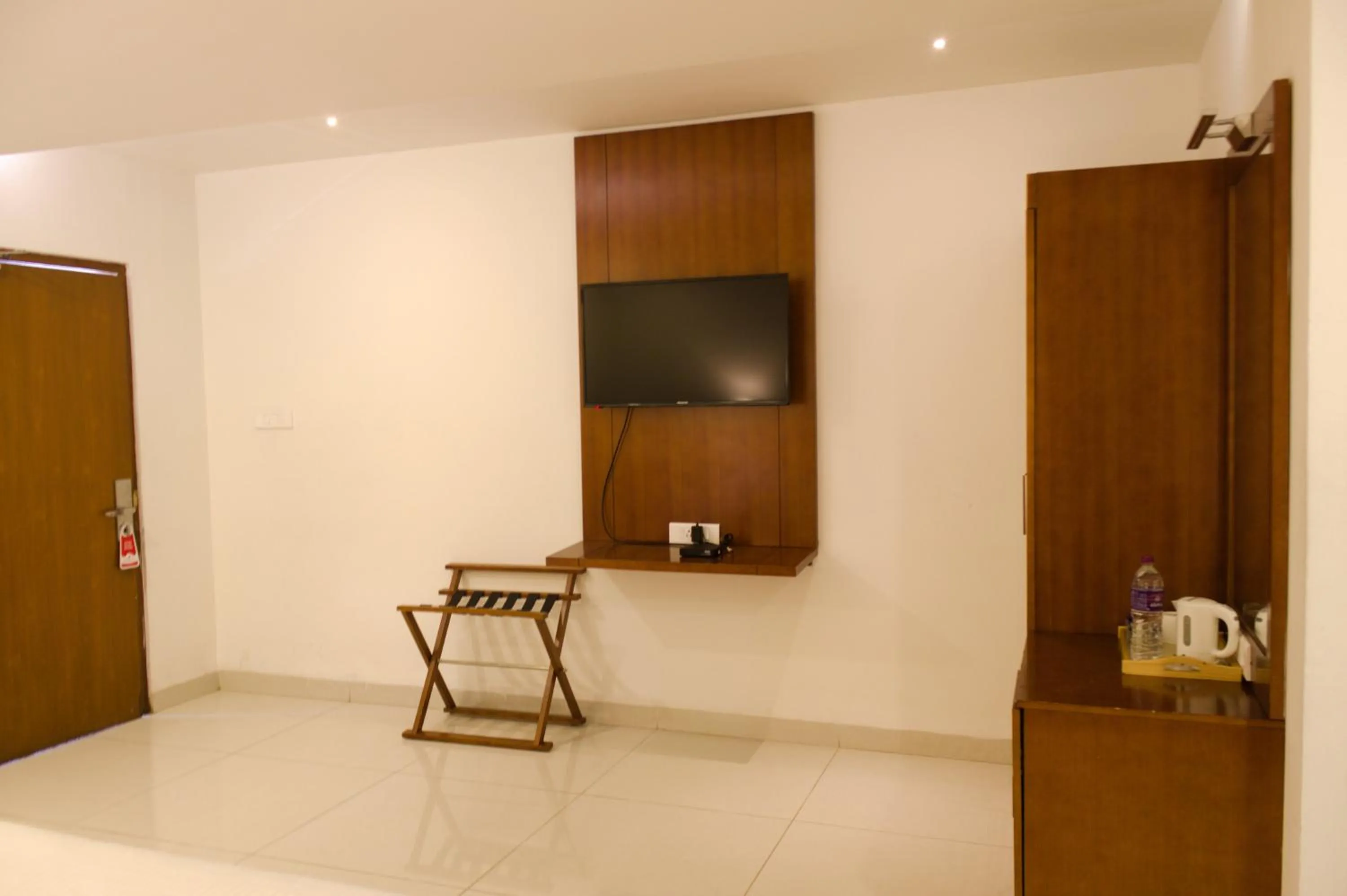 Bedroom in Mrugavani Resort & Spa