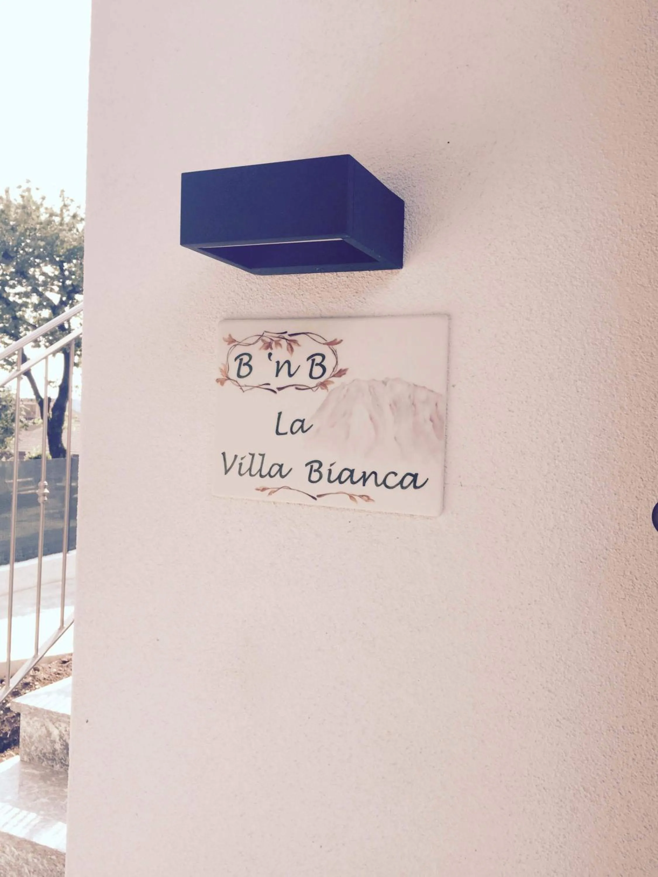 Property logo or sign in La Villa Bianca Guest house