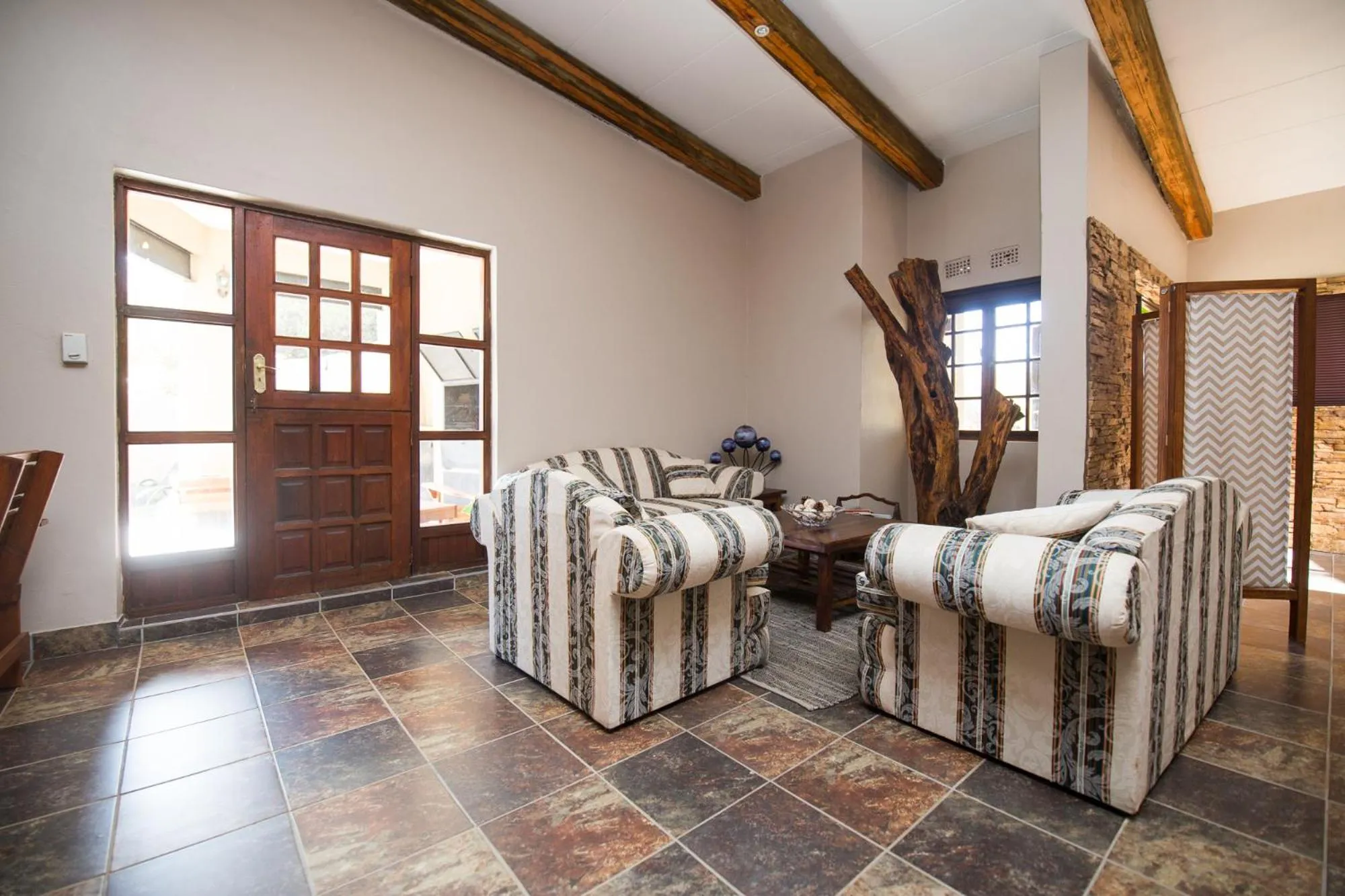 Seating area, Bed in Foreva Wild