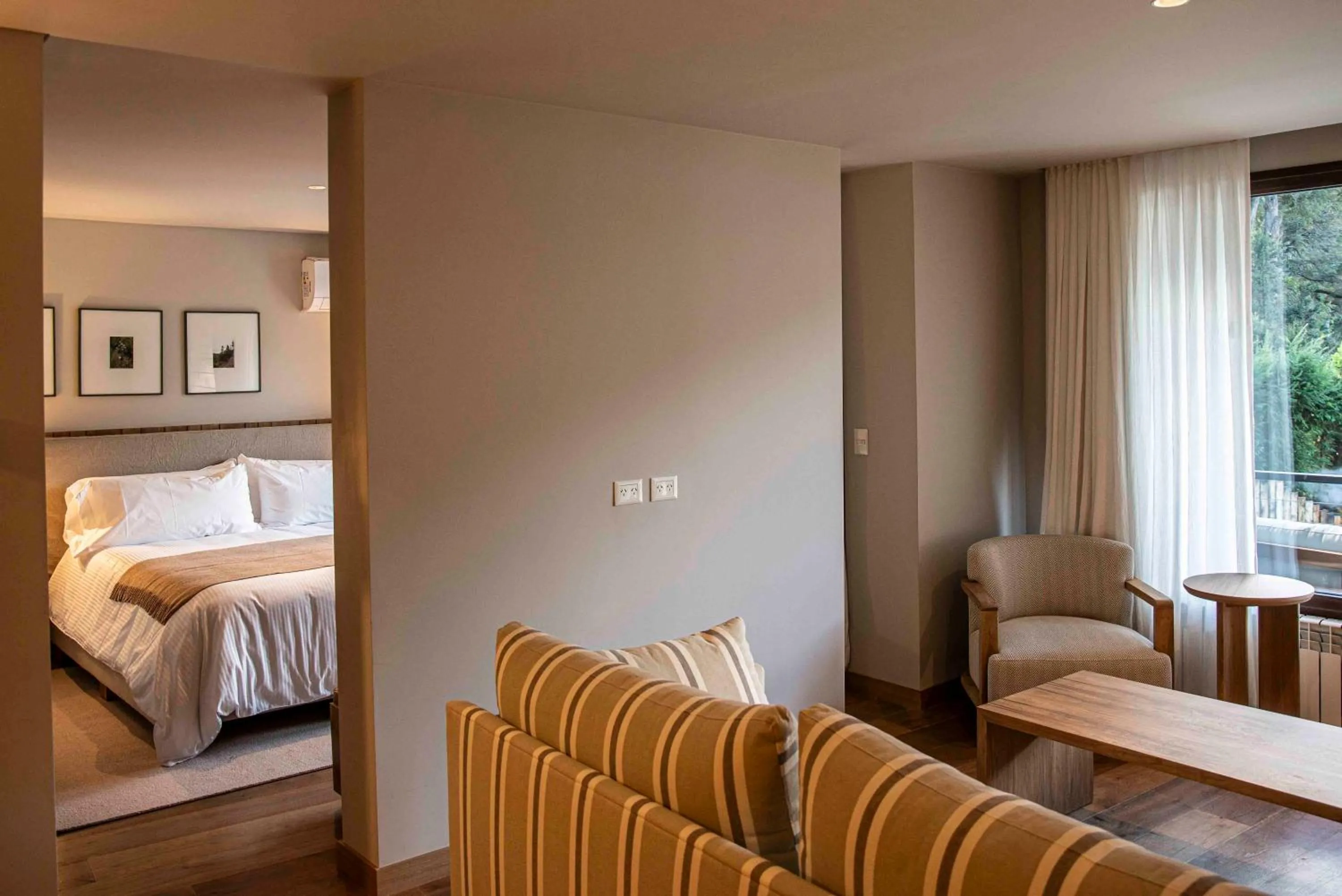 Living room, Bed in Auria Angostura