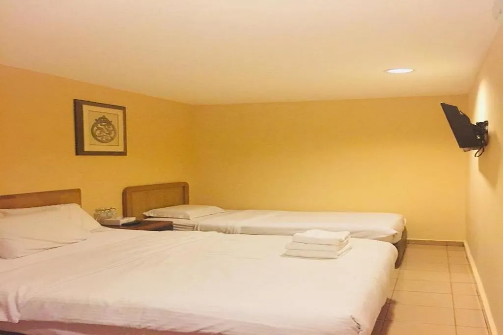 Bed in Hotel Reko Inn