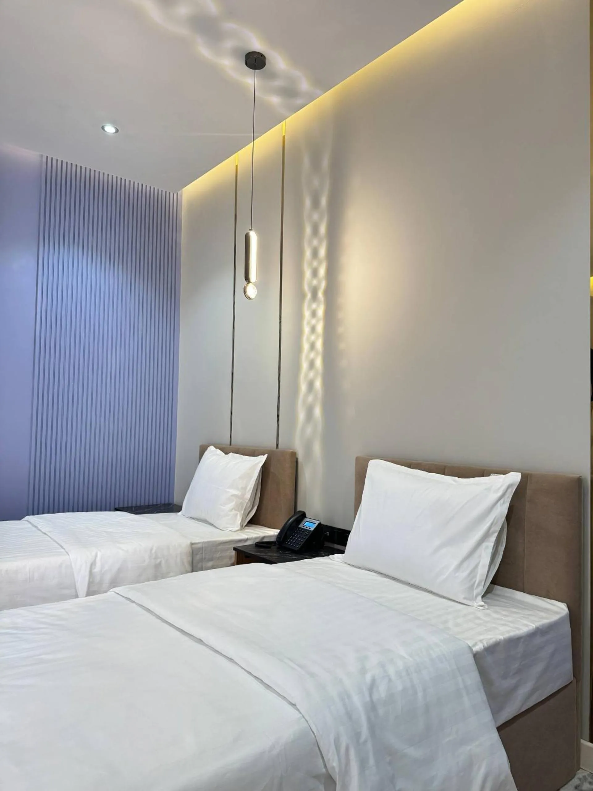 Bed in Rich Land Hotel