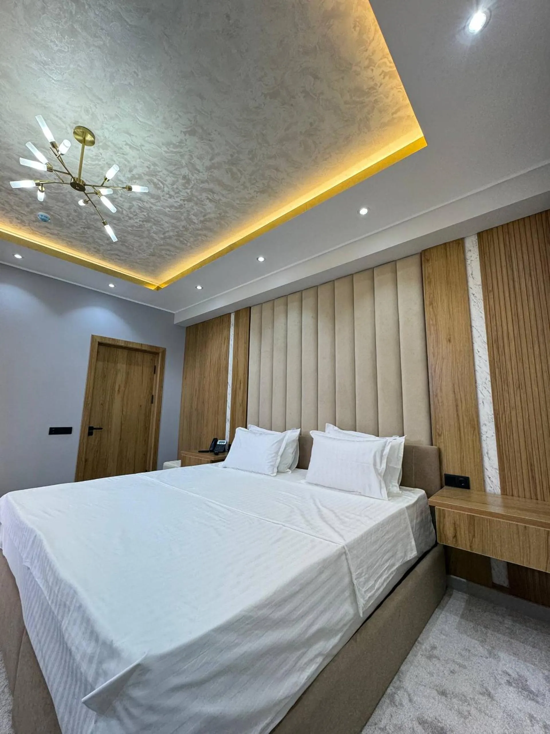 Bed in Rich Land Hotel
