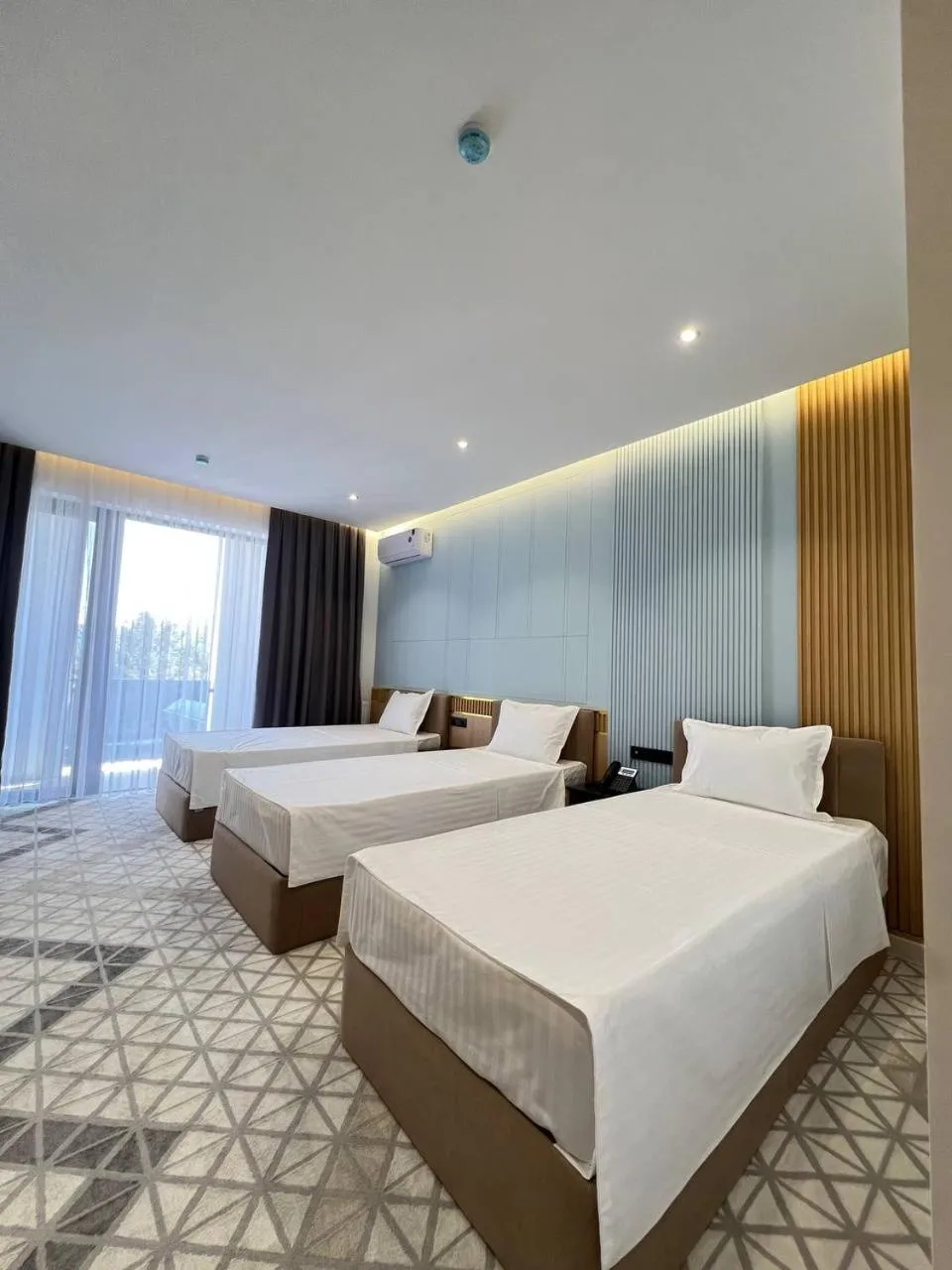 Photo of the whole room, Bed in Rich Land Hotel