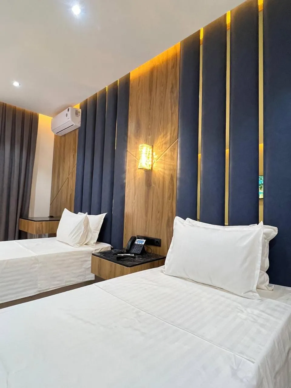 Photo of the whole room, Bed in Rich Land Hotel