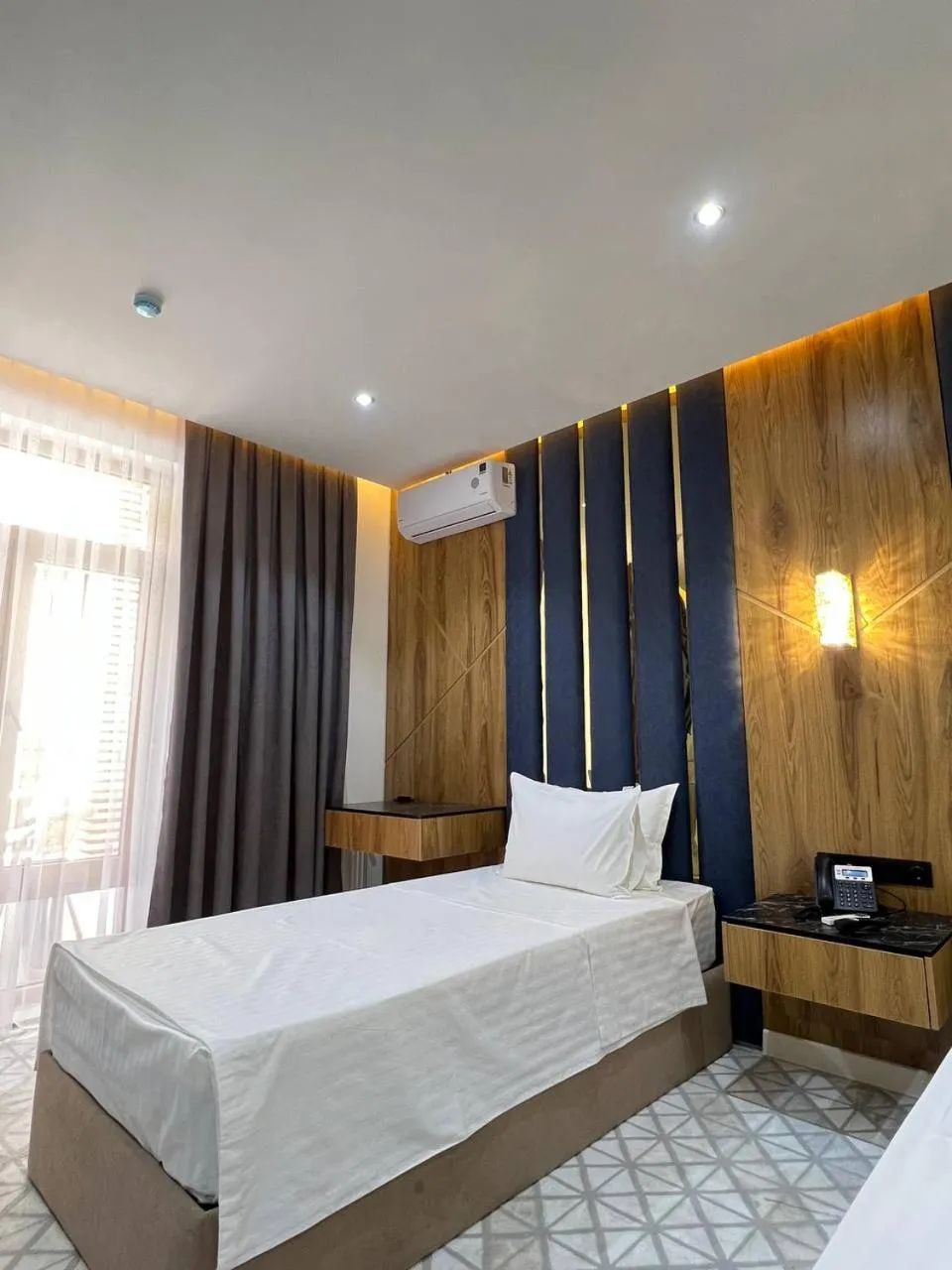 Photo of the whole room, Bed in Rich Land Hotel
