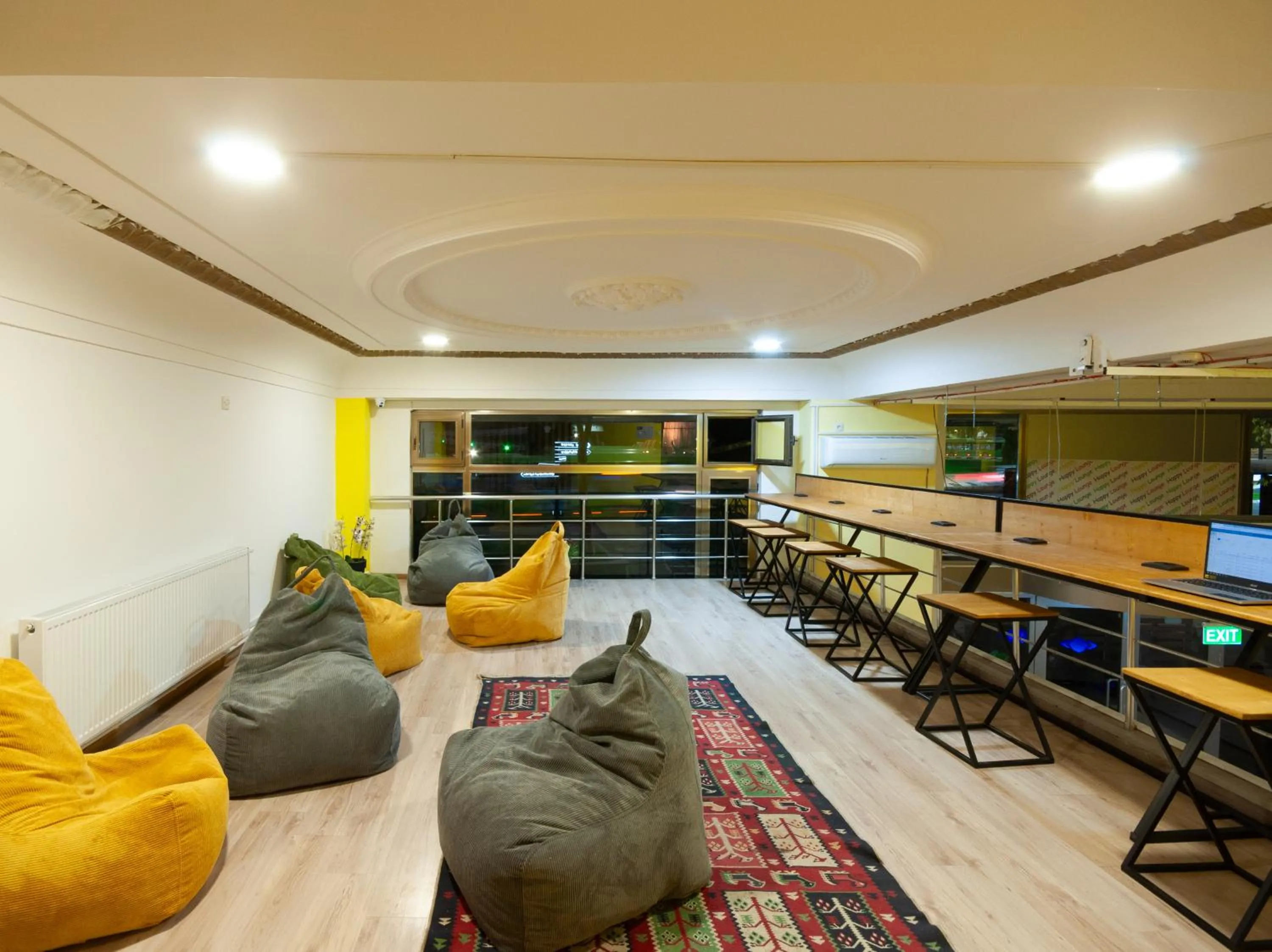 Communal lounge/ TV room in Capsule Hotel Happy lounge