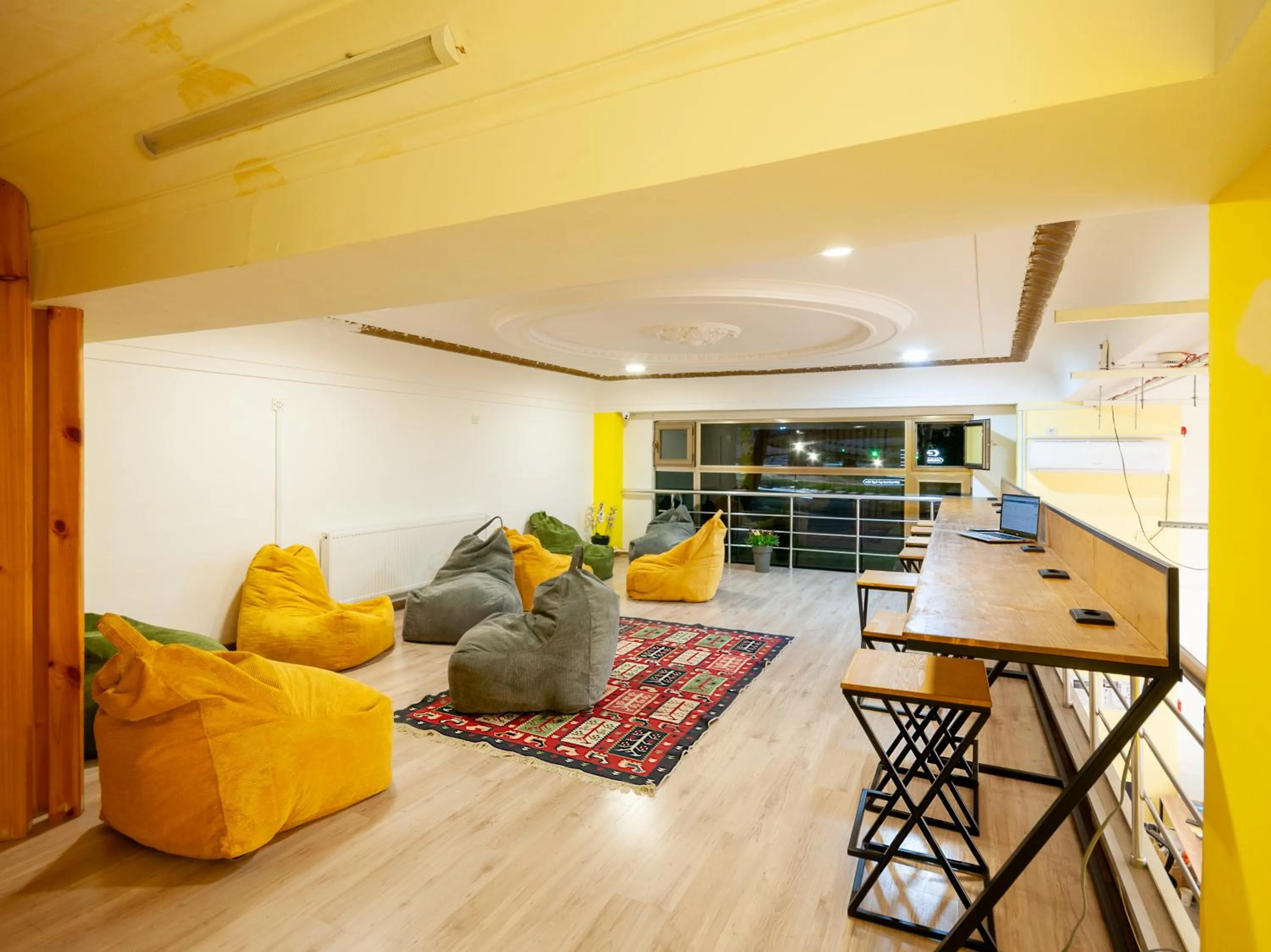 Communal lounge/ TV room in Capsule Hotel Happy lounge