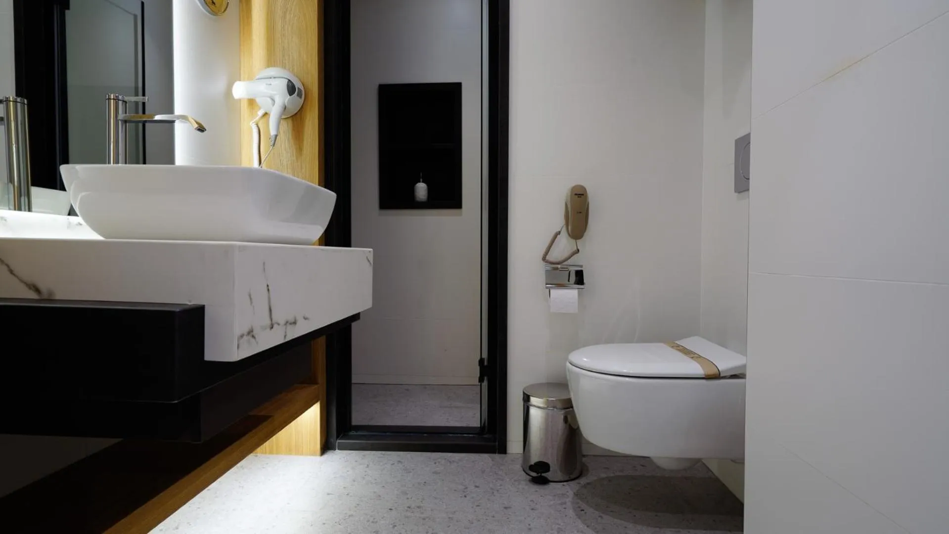 Toilet, Bed in RUKA Hotel