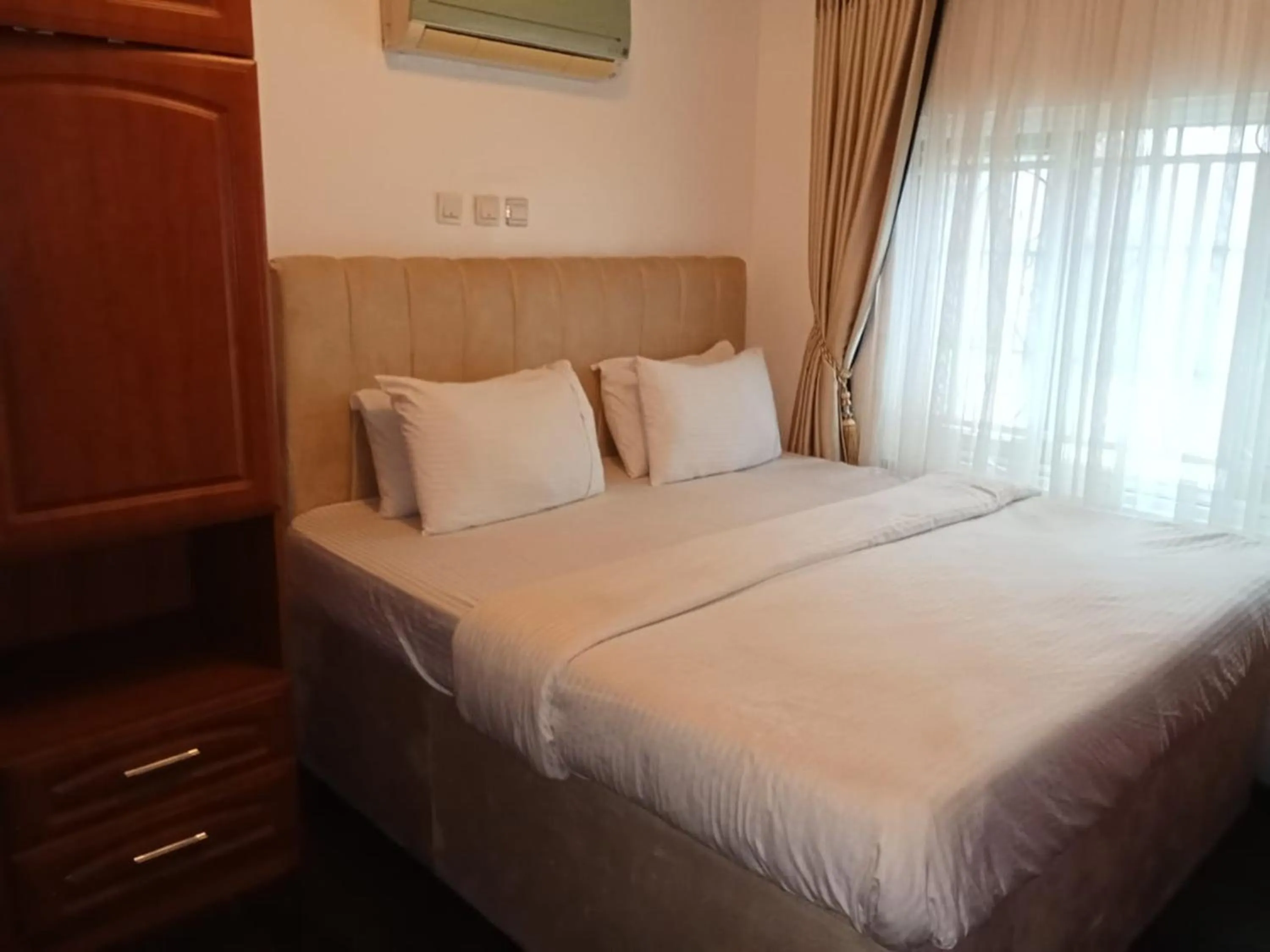 Bed in Lake 47 Suites Ltd