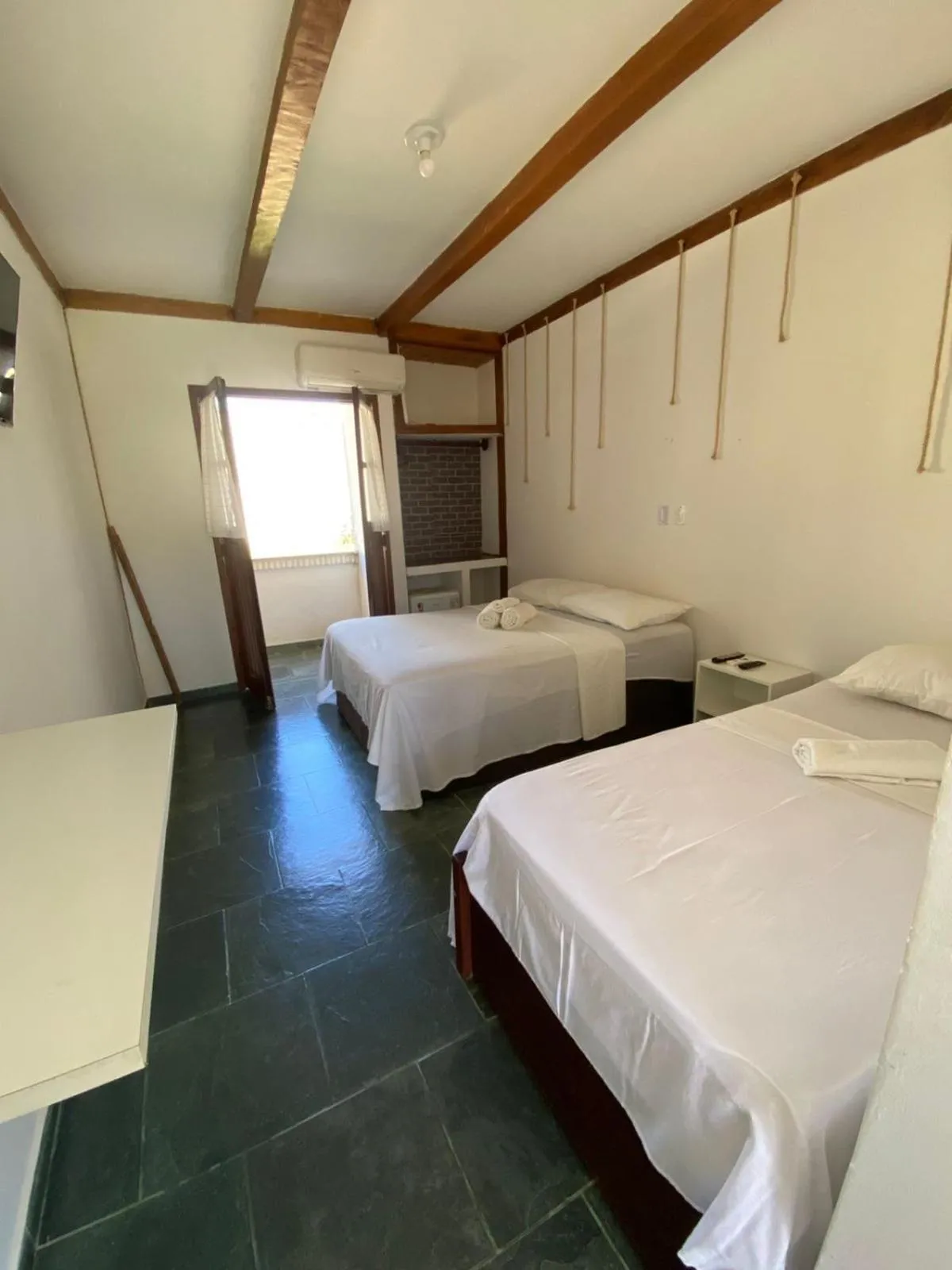 Bed in Pousada Canavieiras Bahia