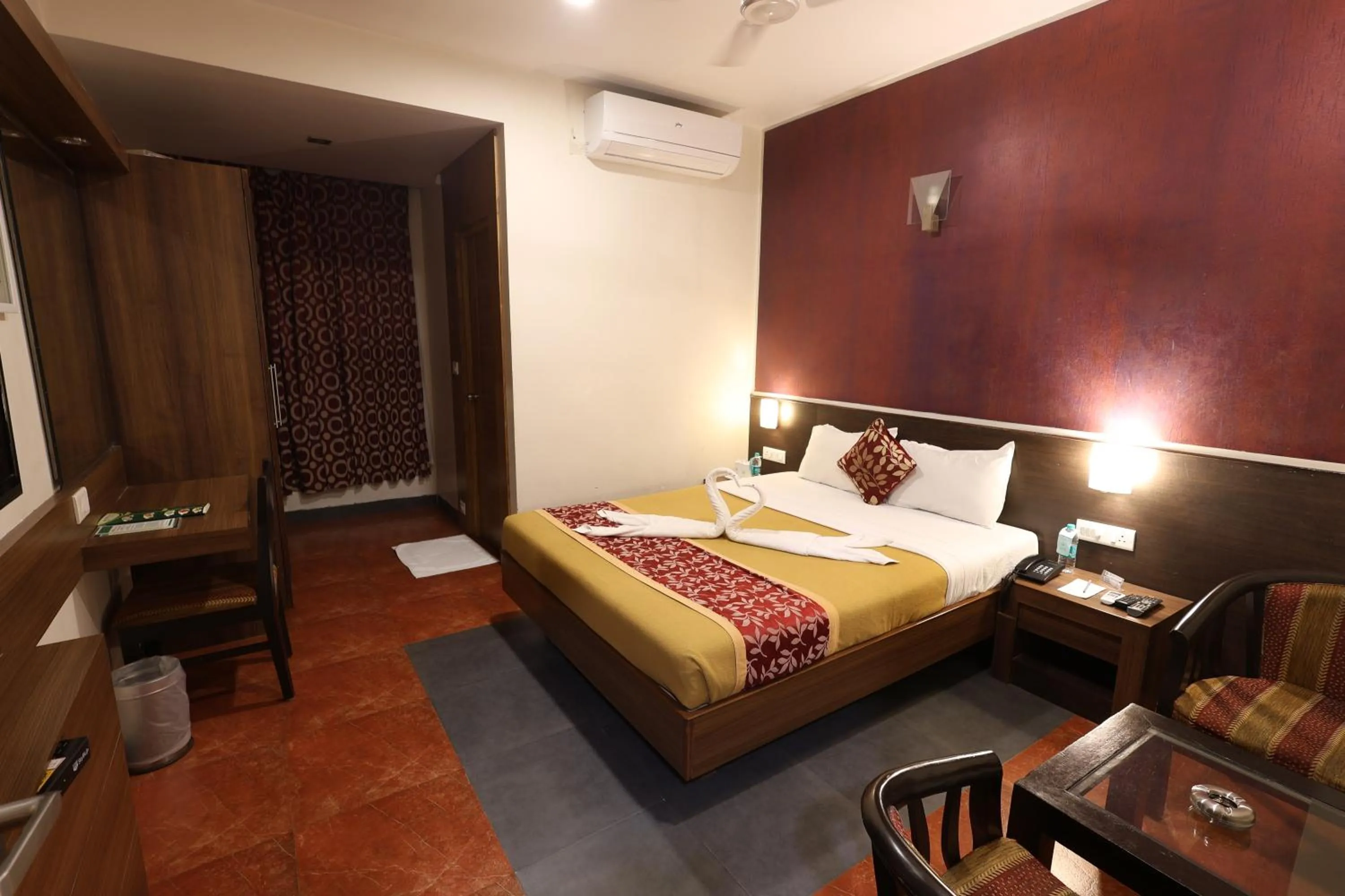 Bed in Abirami Residency