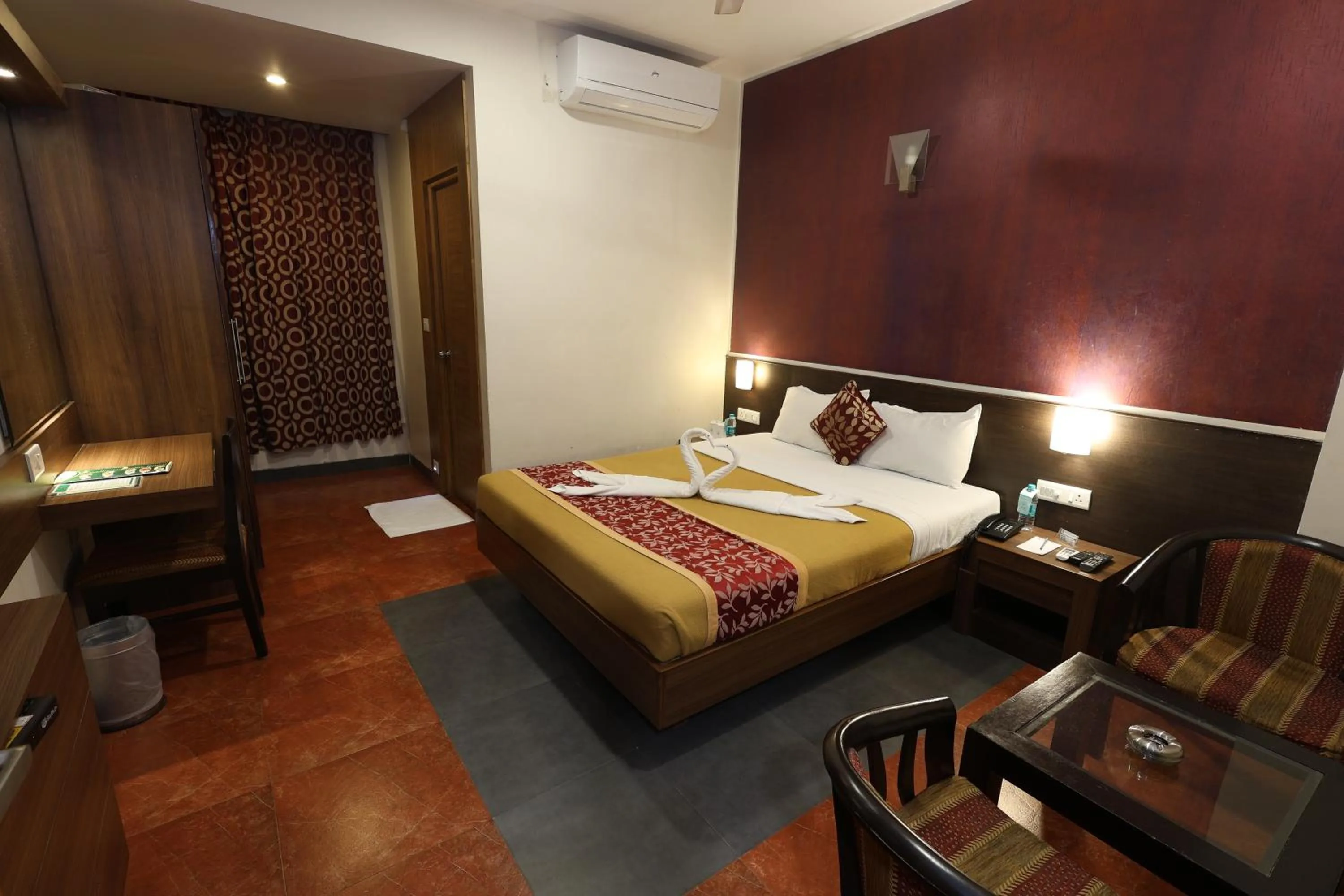 Bed in Abirami Residency