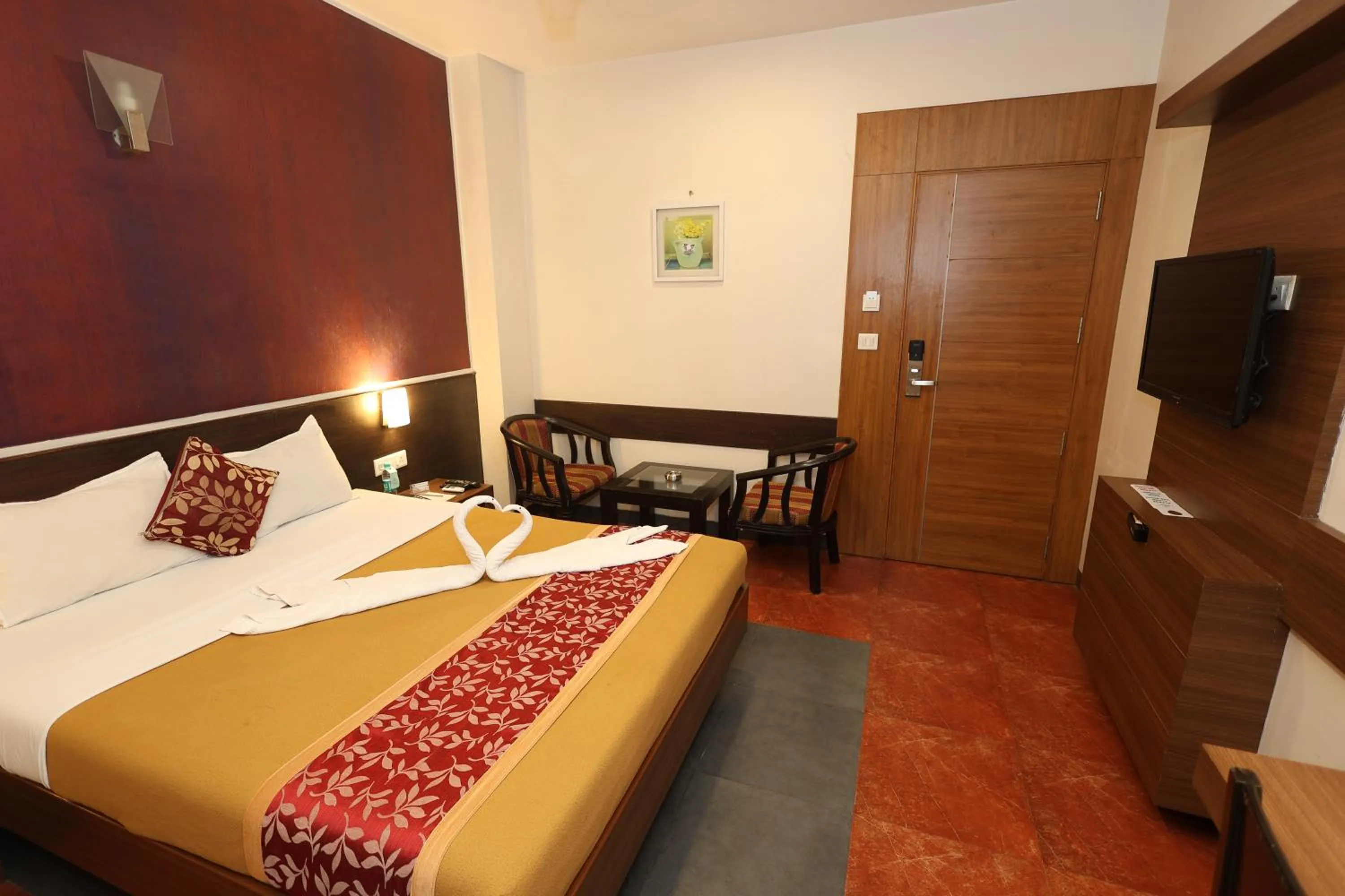 Bed in Abirami Residency