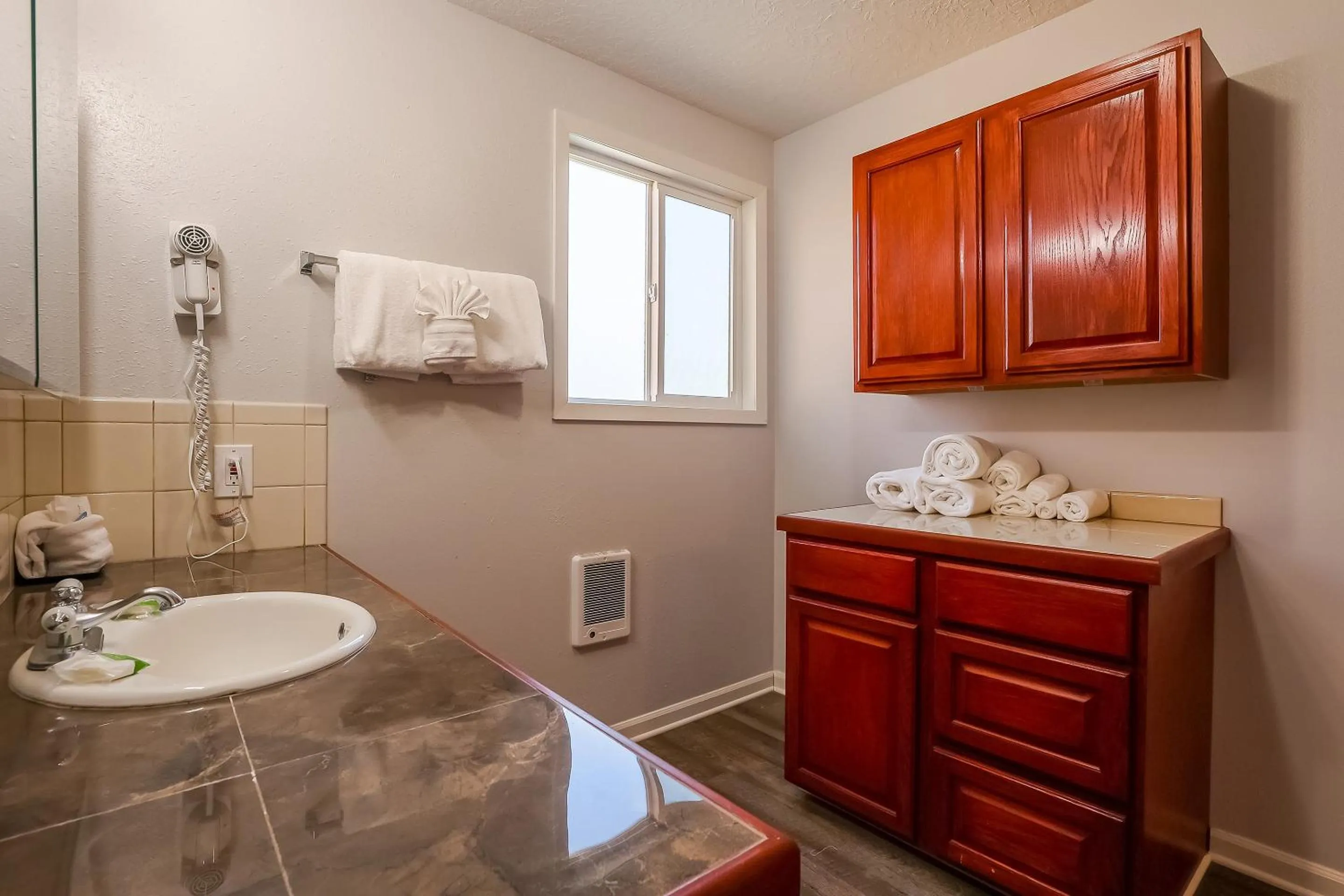 Bathroom in Coast River Inn by OYO Seaside