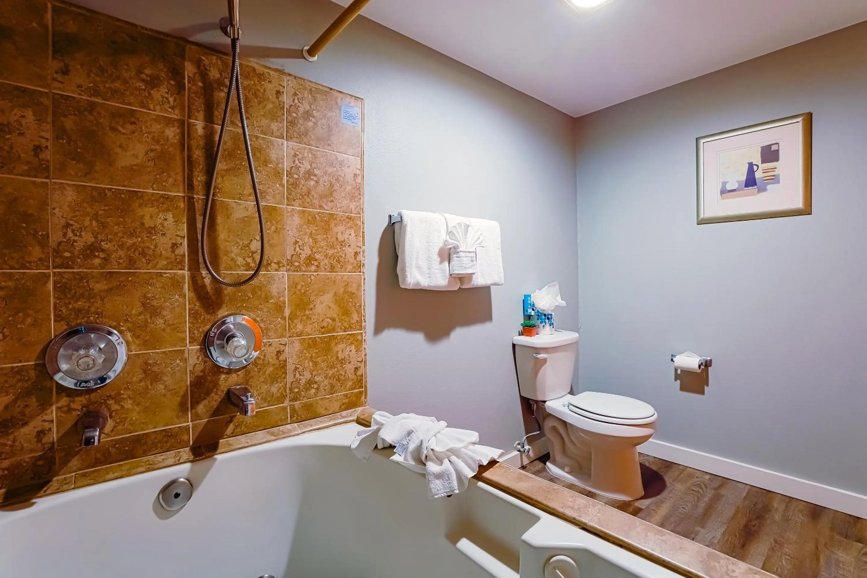 Bathroom in Coast River Inn by OYO Seaside