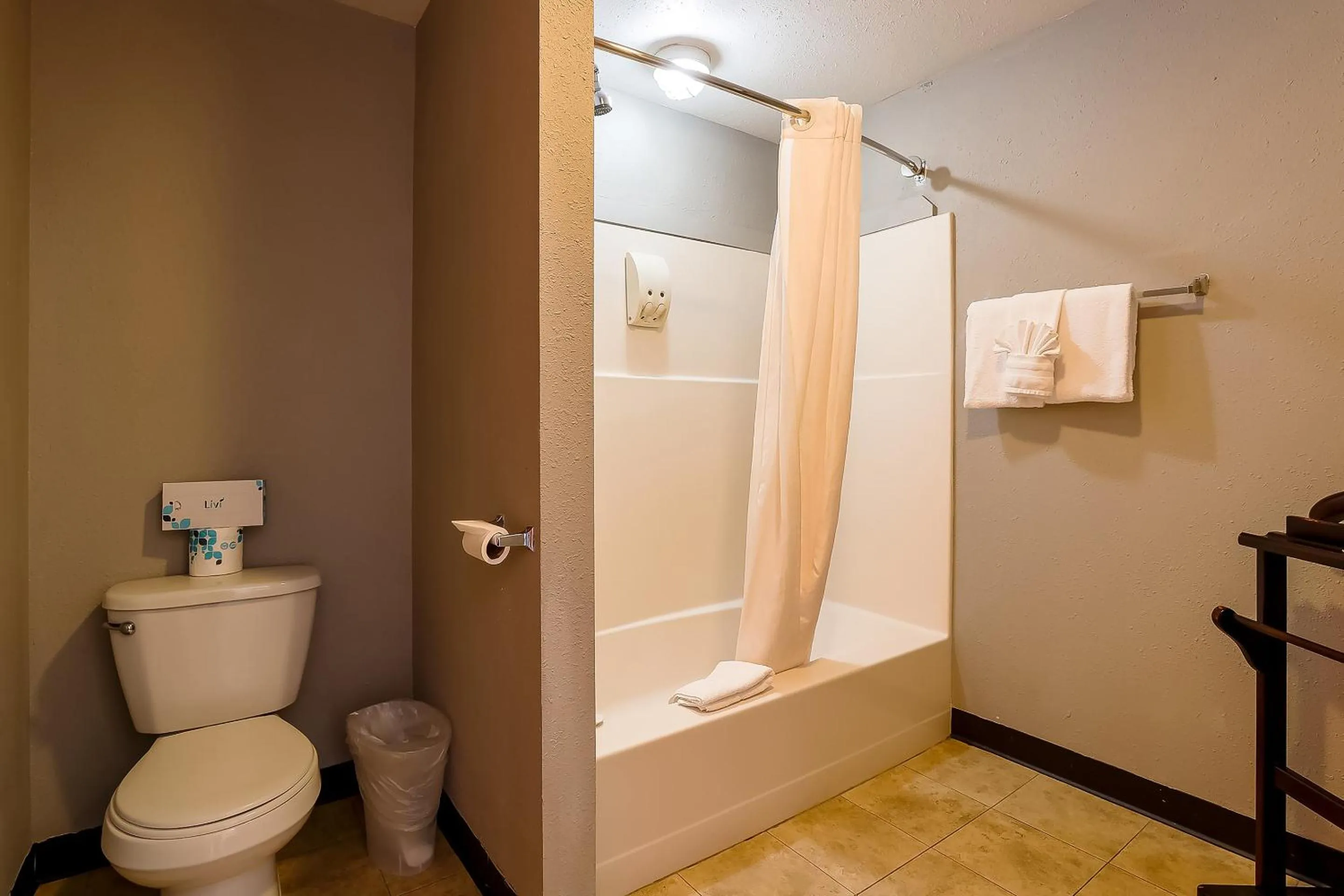 Bathroom in Coast River Inn by OYO Seaside