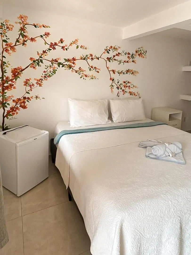 Bed in Pousada Praia e Conforto