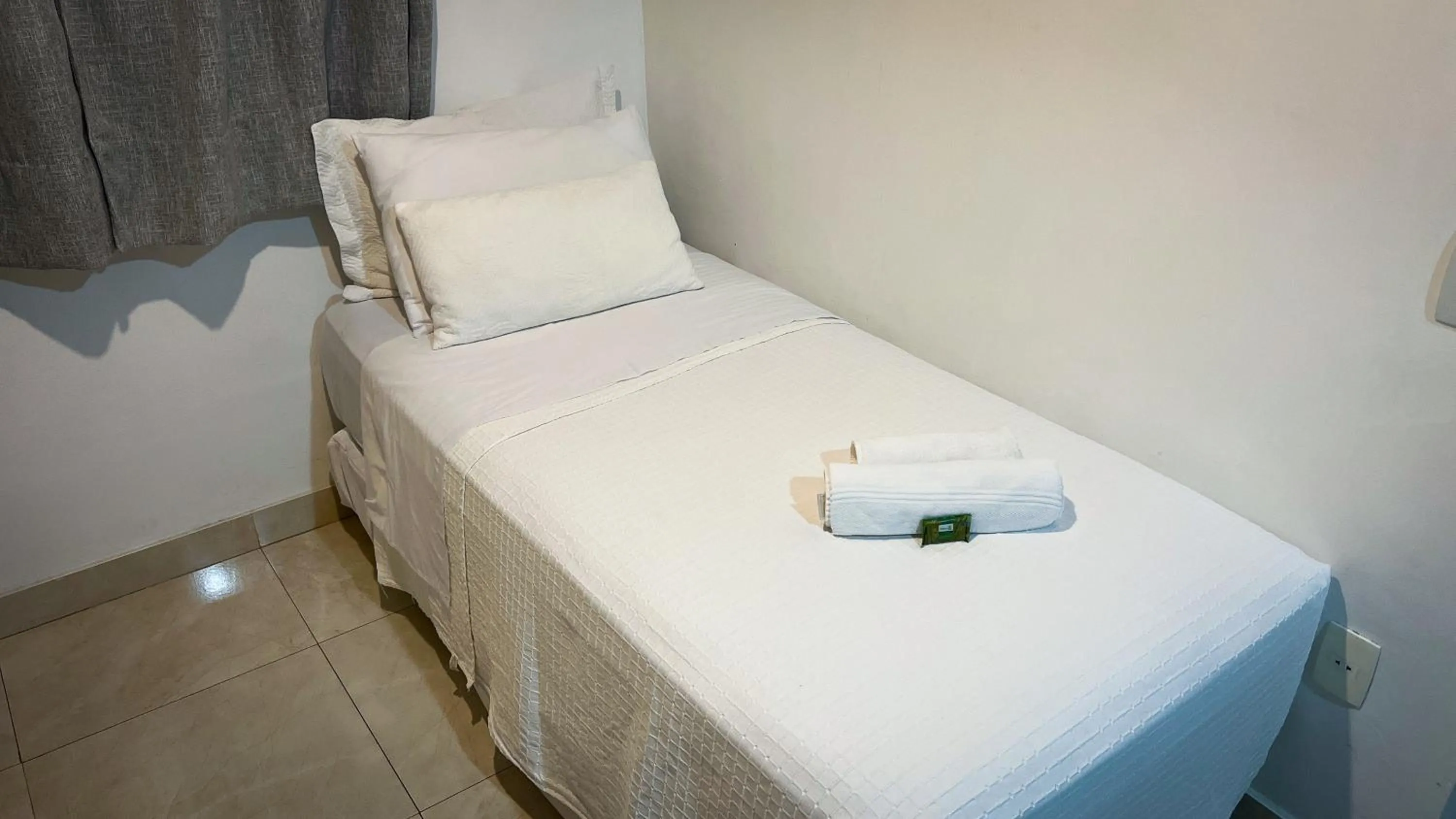 Bed in Pousada Praia e Conforto