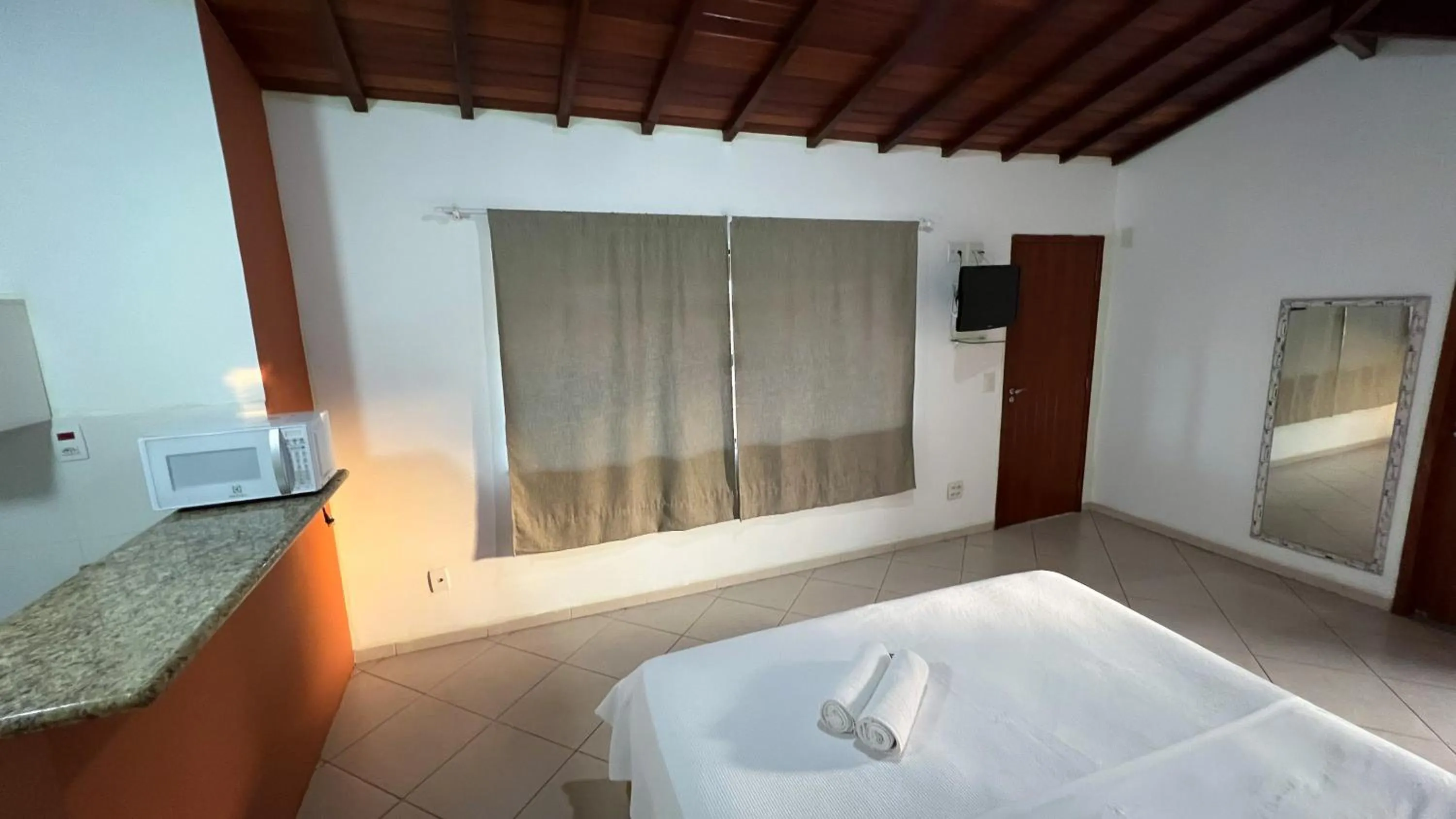 Bed in Pousada Praia e Conforto