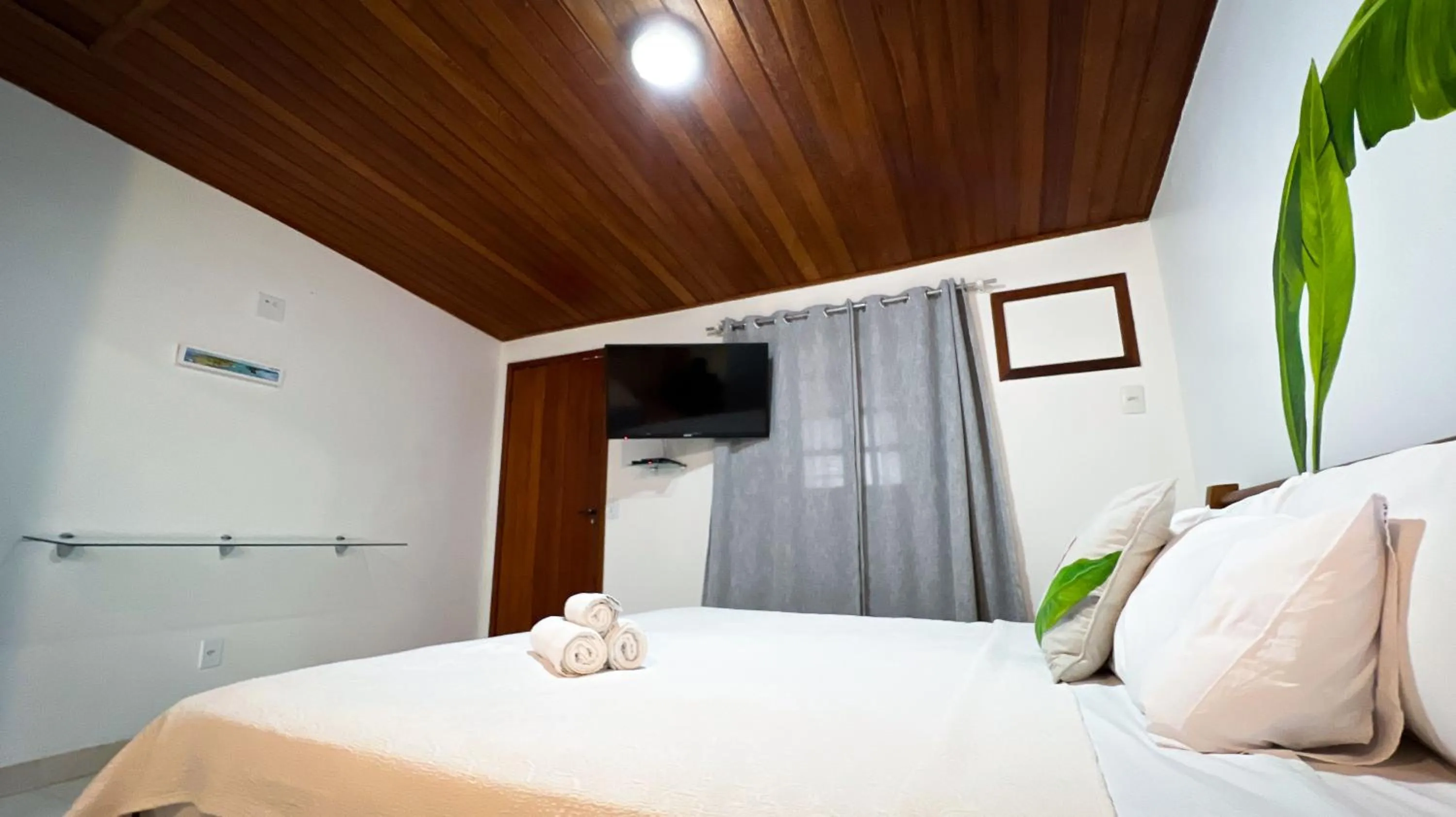 Bed in Pousada Praia e Conforto