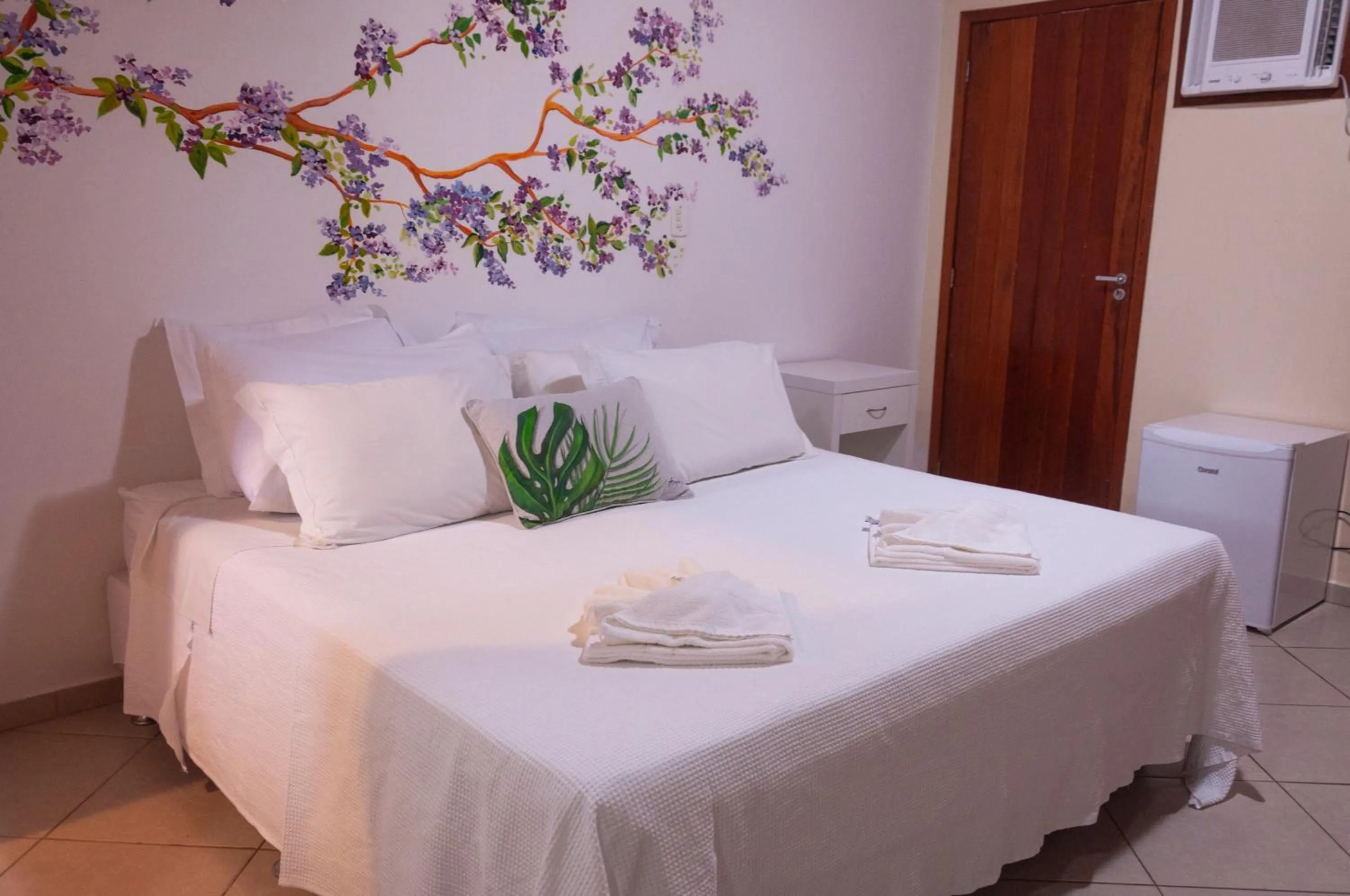 Bed in Pousada Praia e Conforto