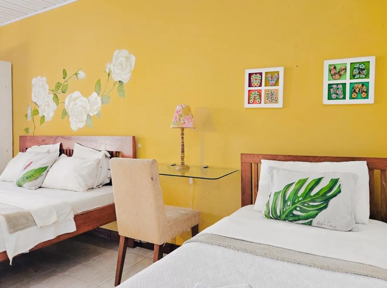 Bed in Pousada Praia e Conforto