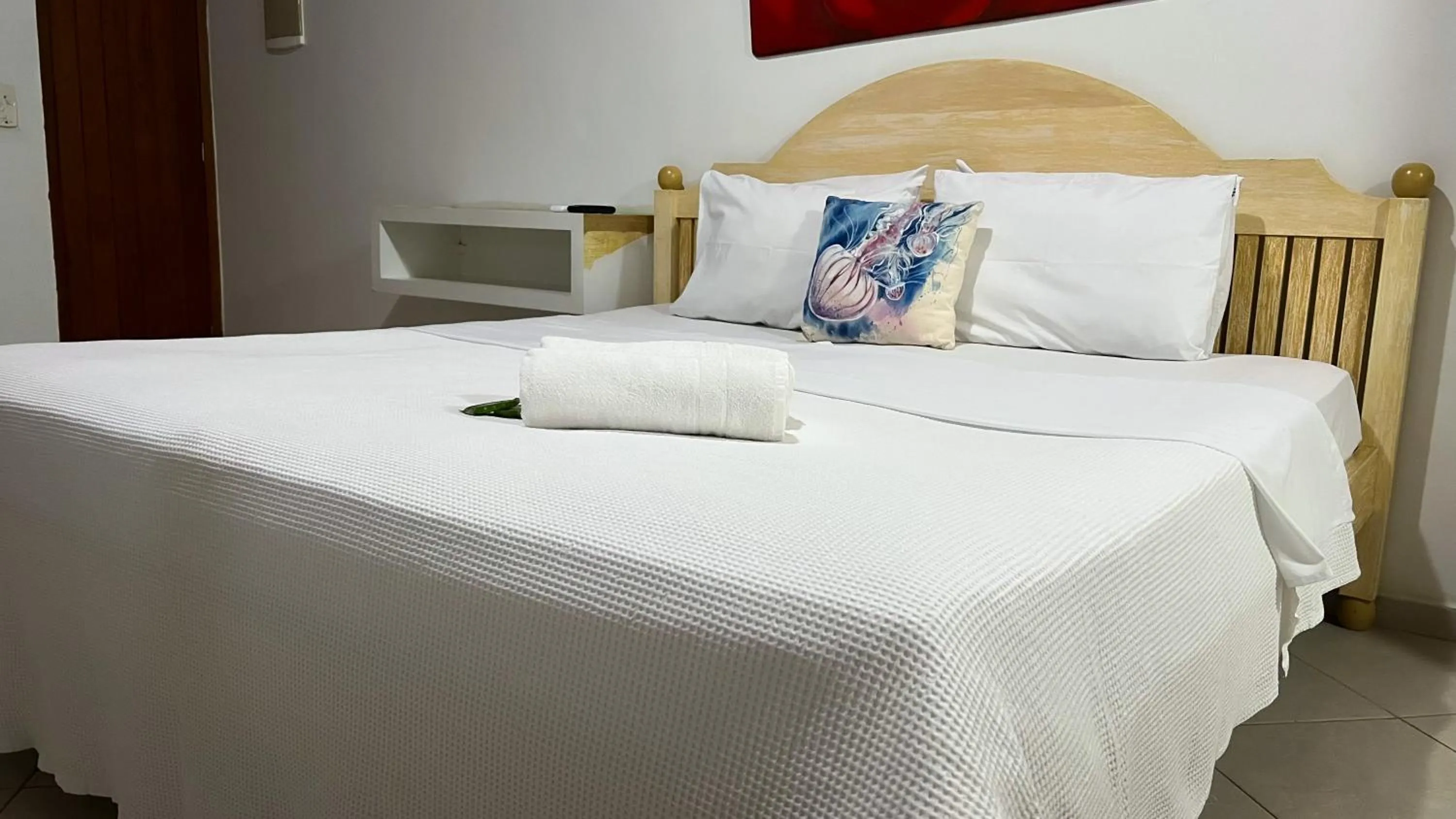 Bed in Pousada Praia e Conforto