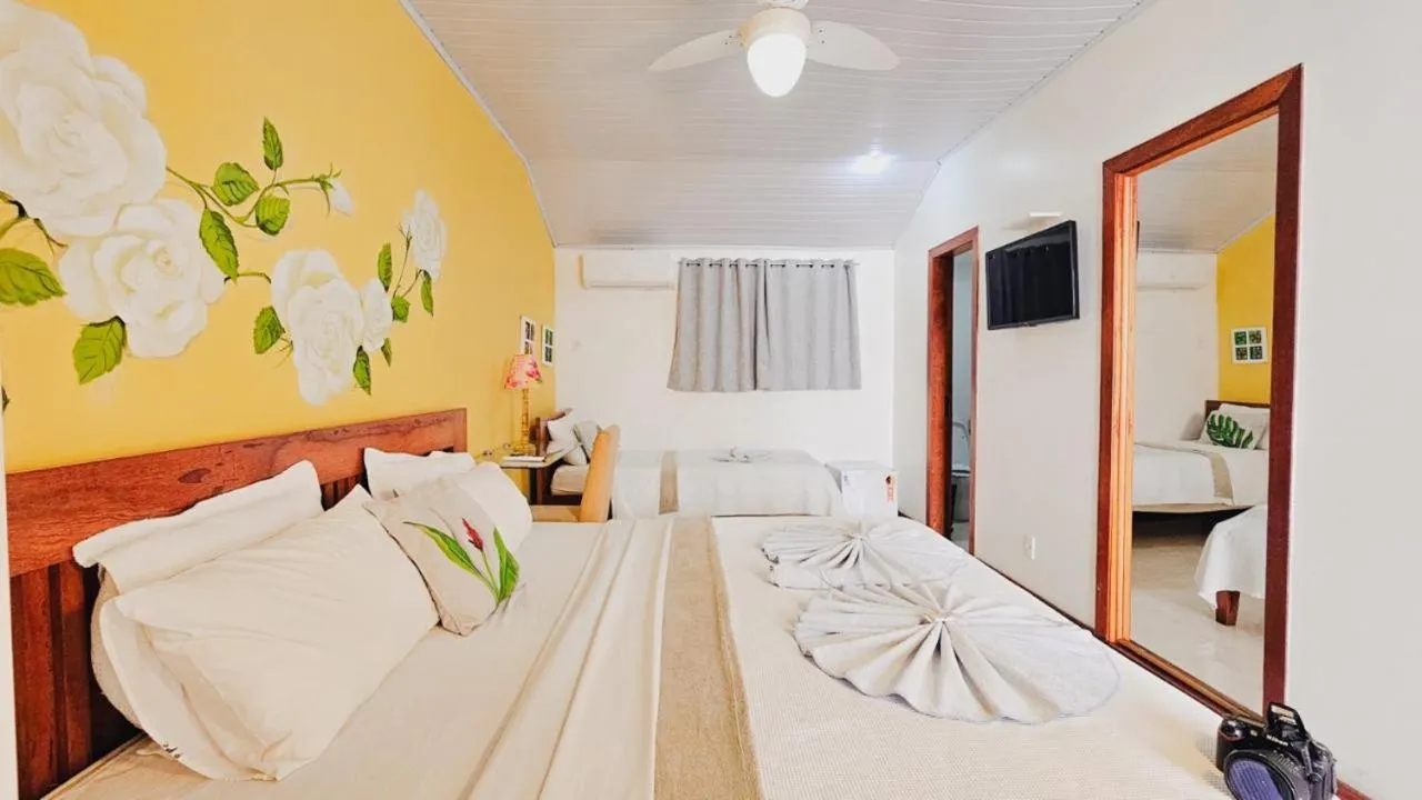 Bed in Pousada Praia e Conforto