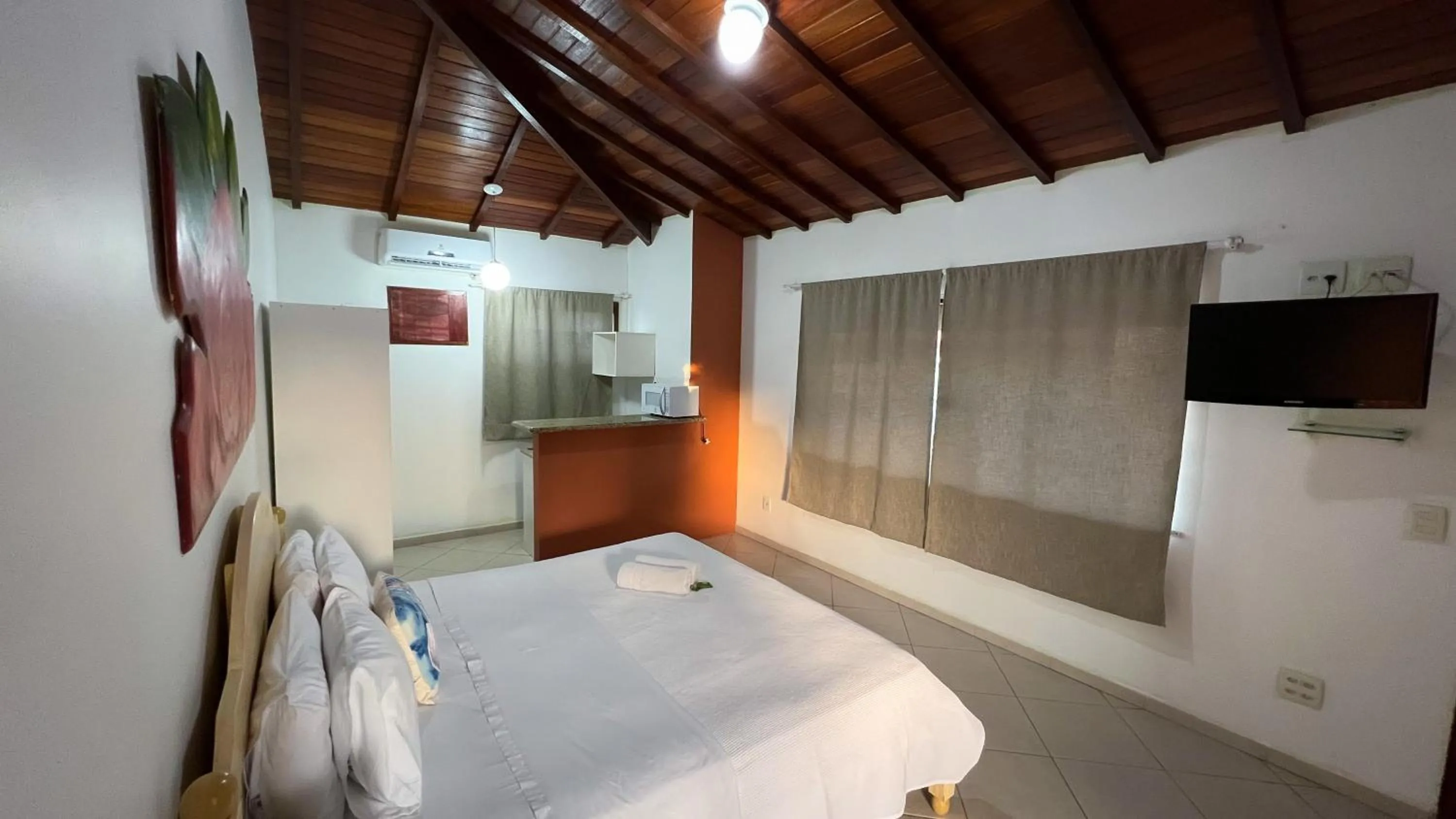 Bed in Pousada Praia e Conforto