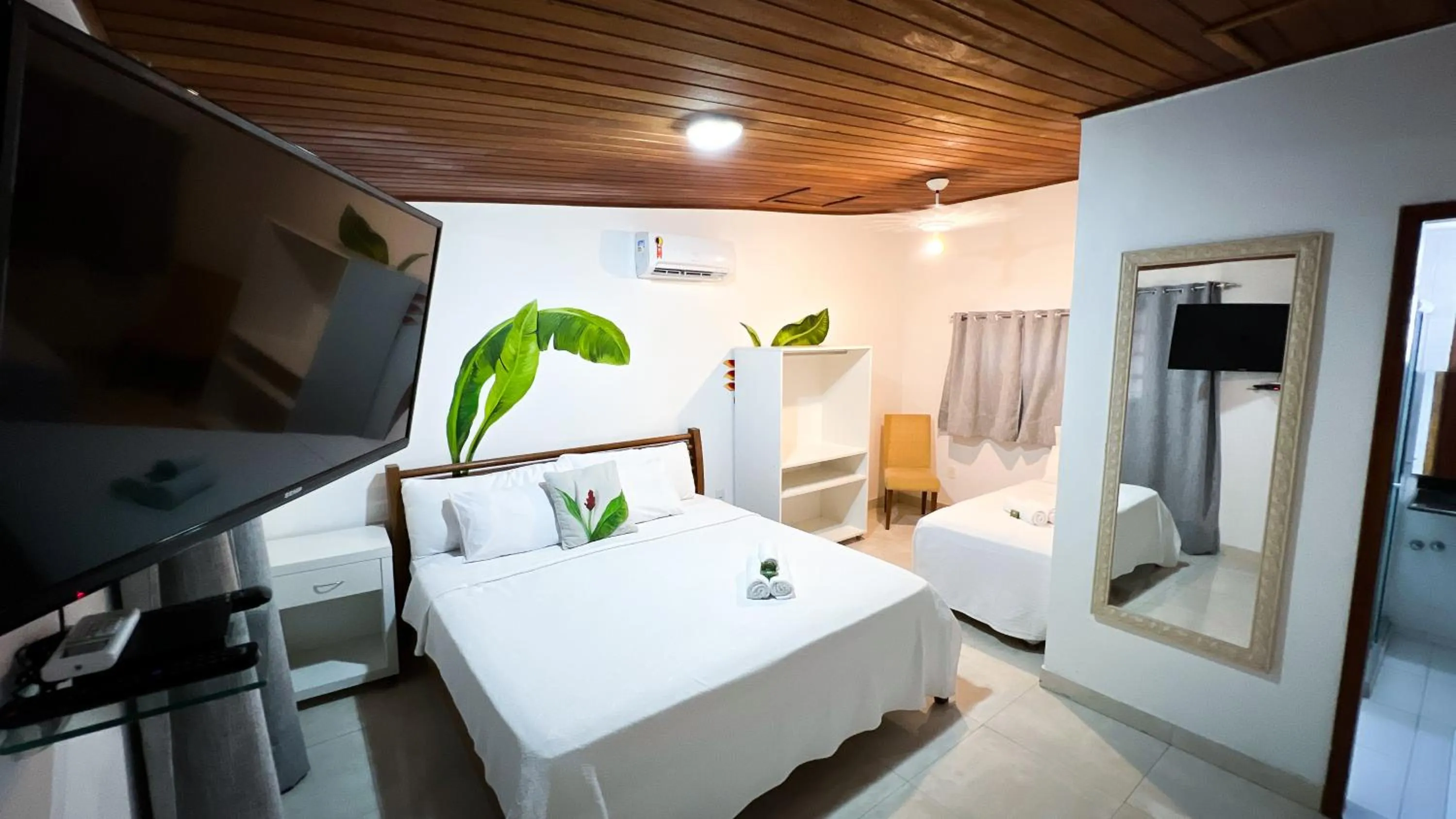 Bed in Pousada Praia e Conforto