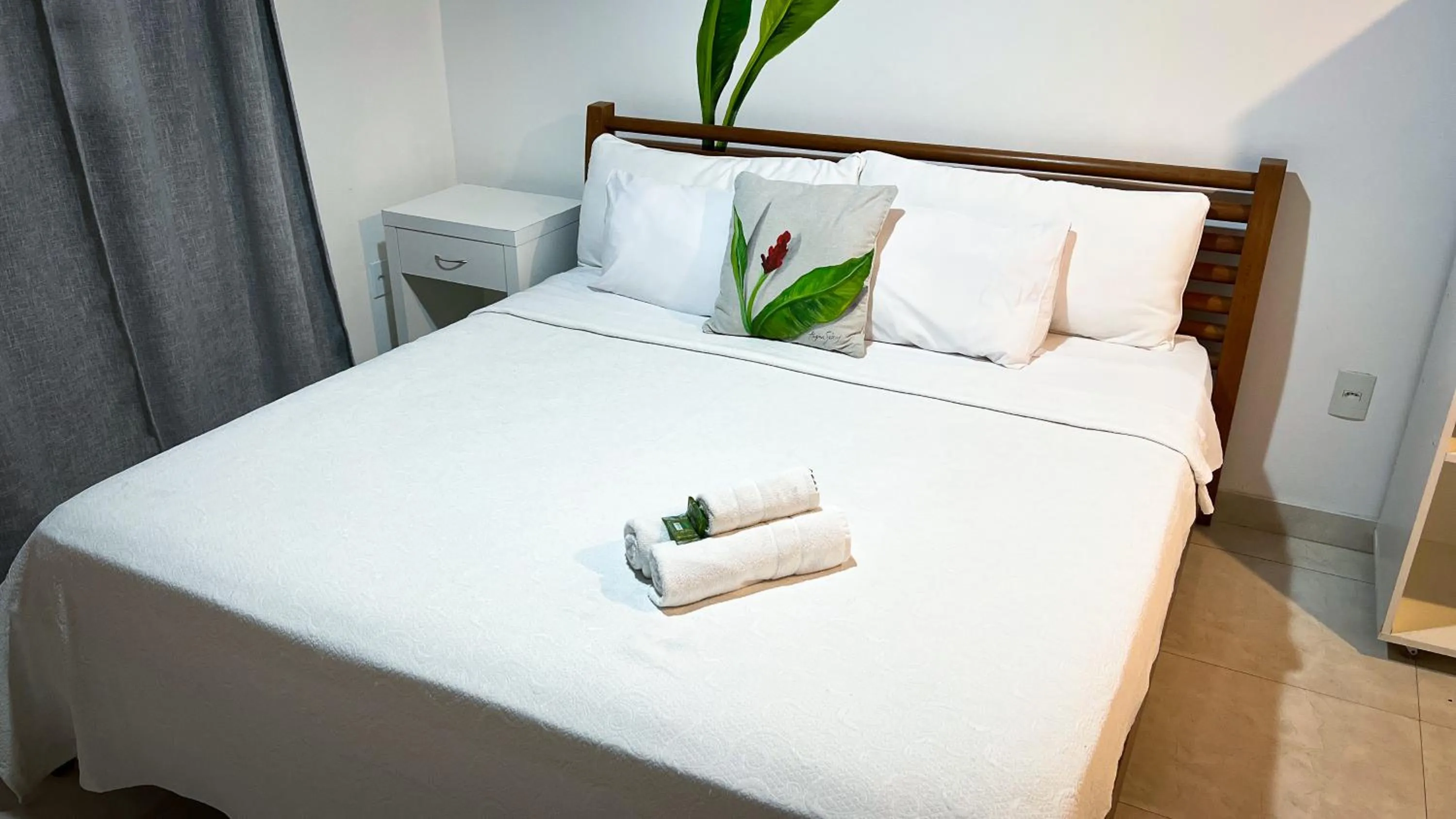 Bed in Pousada Praia e Conforto