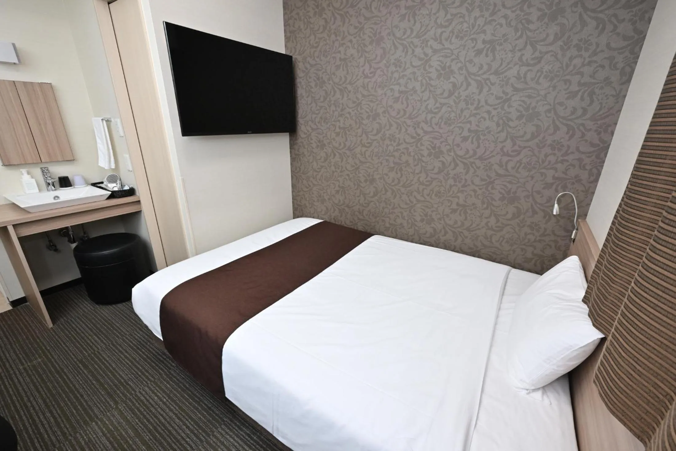 Bed in Sanco Inn Grande Tokyo Hamamatsucho