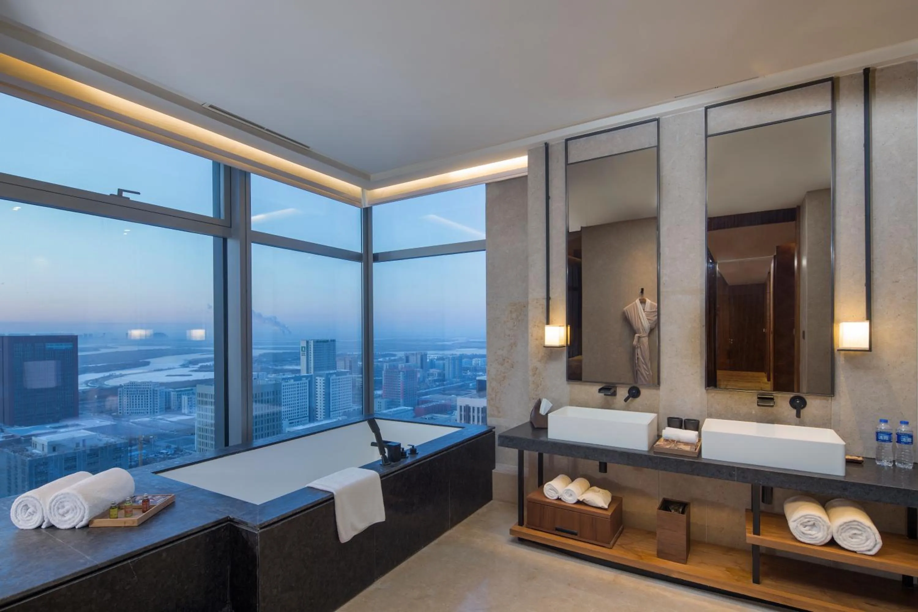 Bathroom, Bed in Aoluguya Hotel Harbin