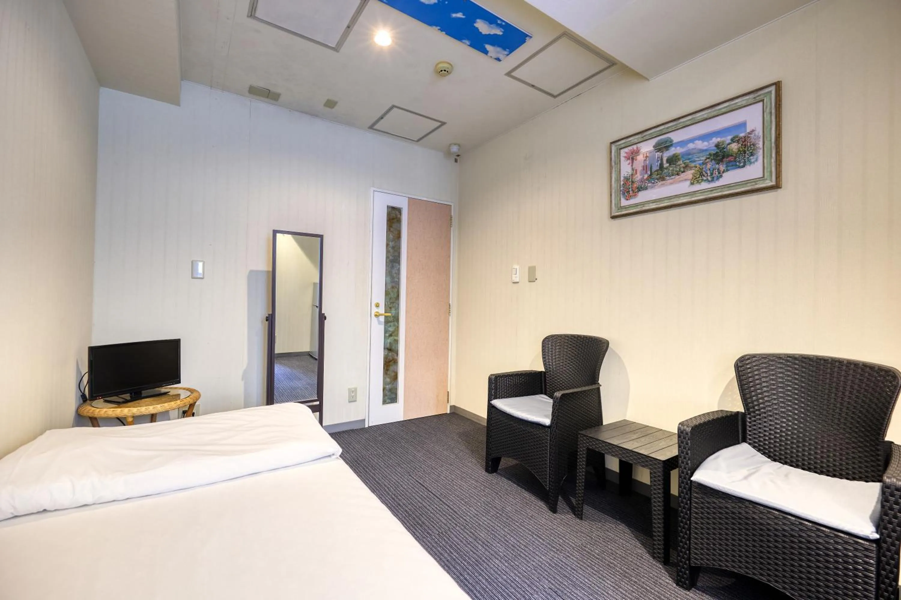 Photo of the whole room in Guest House Grand Naha