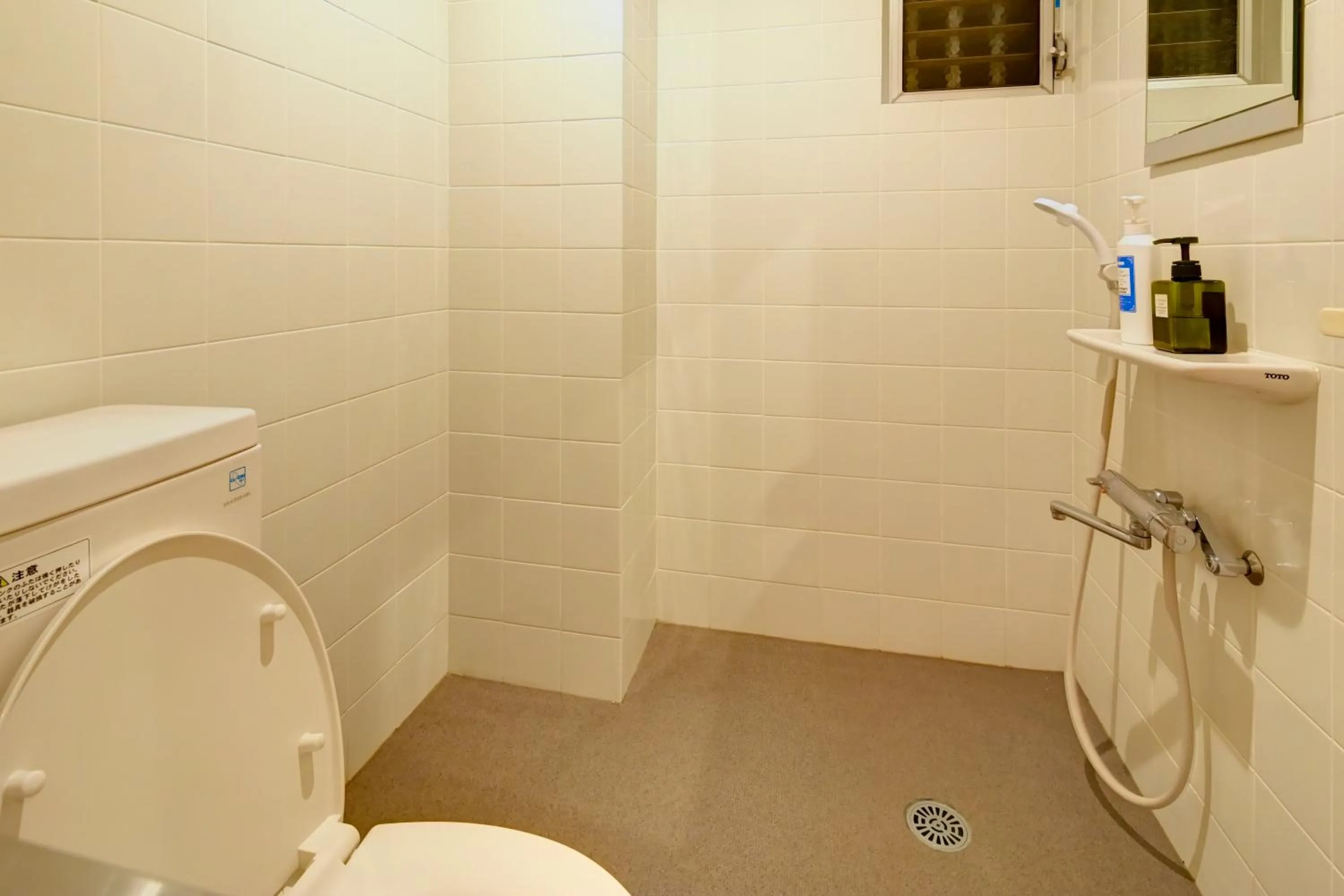 Photo of the whole room in Guest House Grand Naha