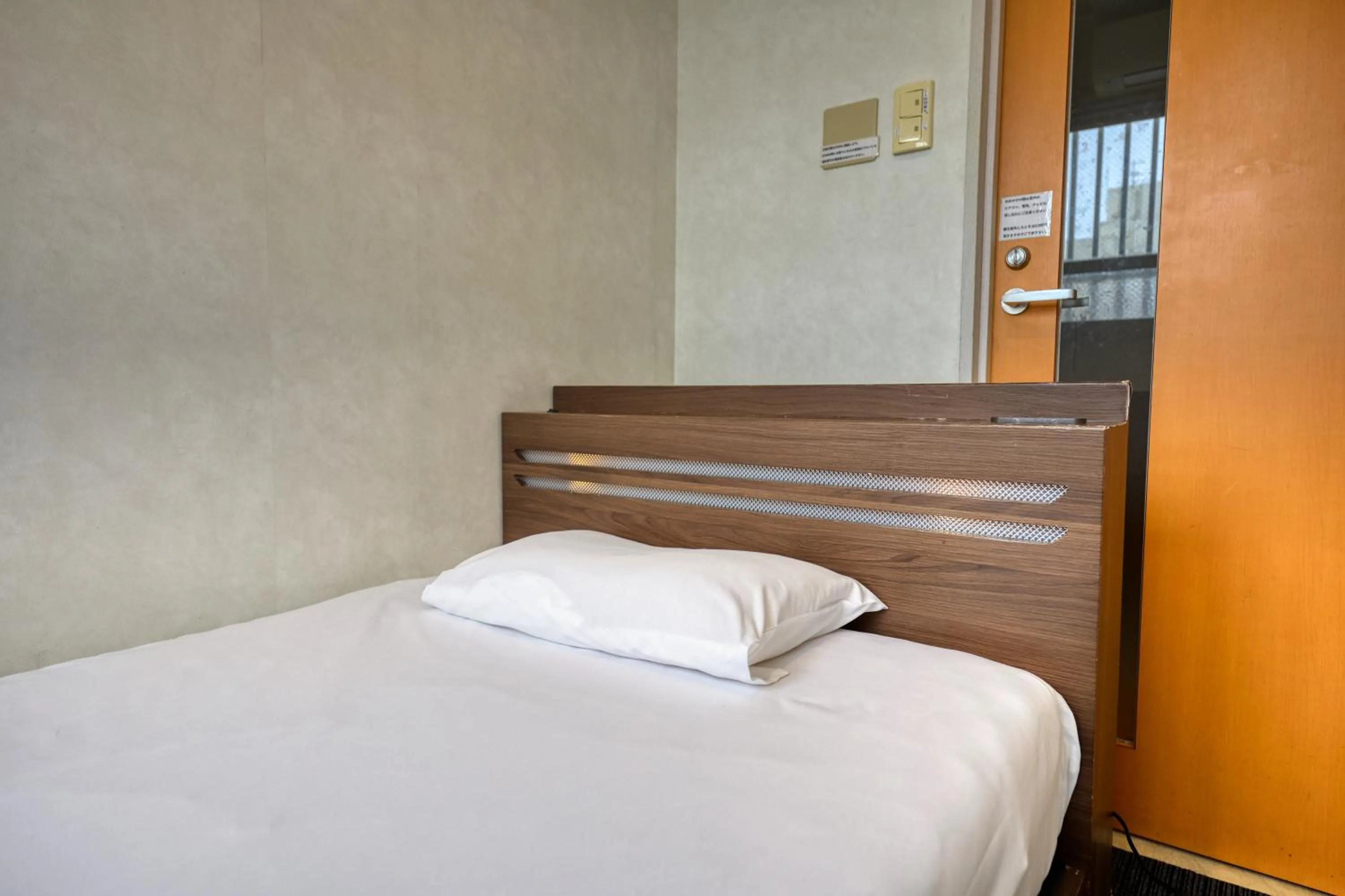 Photo of the whole room in Guest House Grand Naha