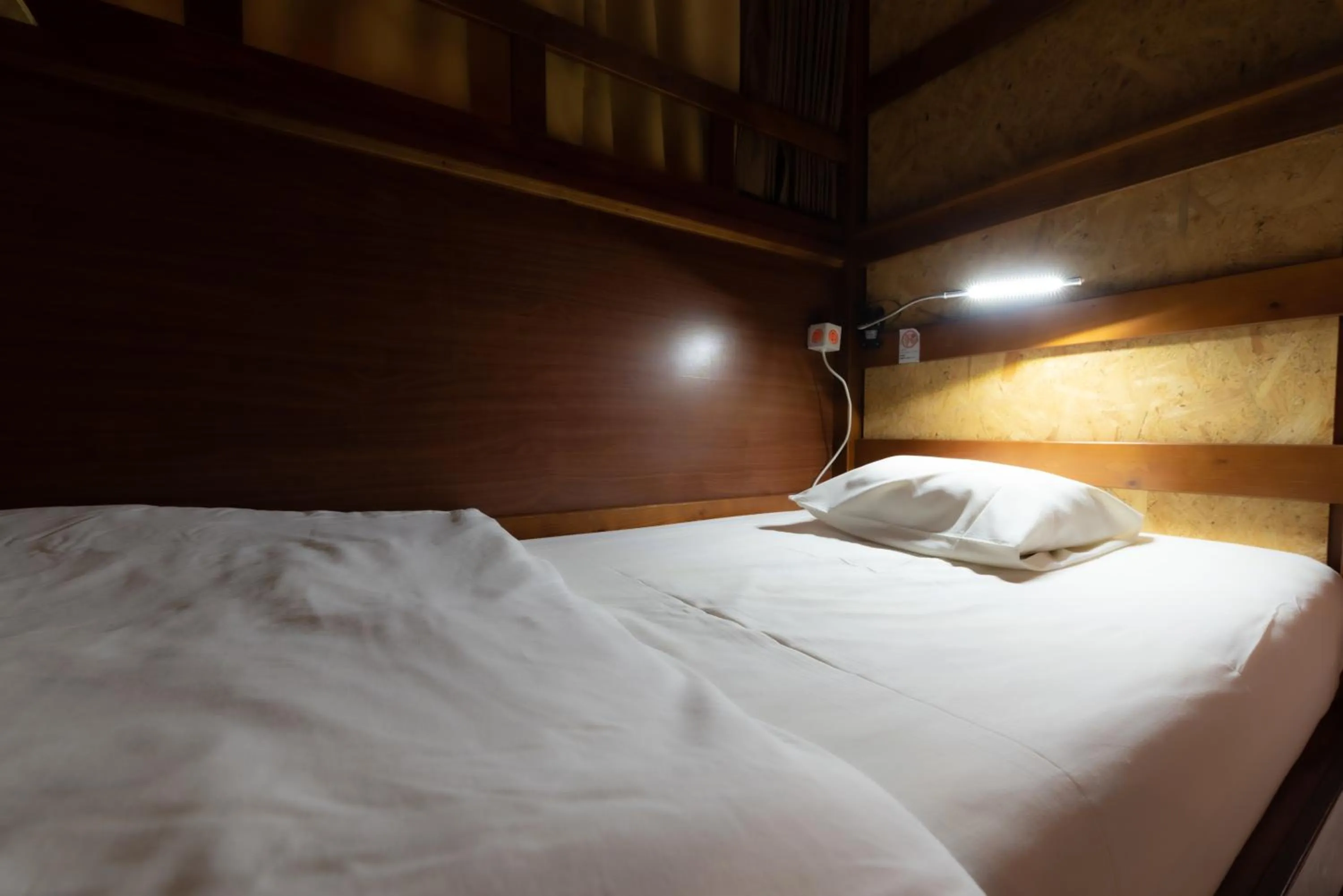 Bed in Guest House Grand Naha