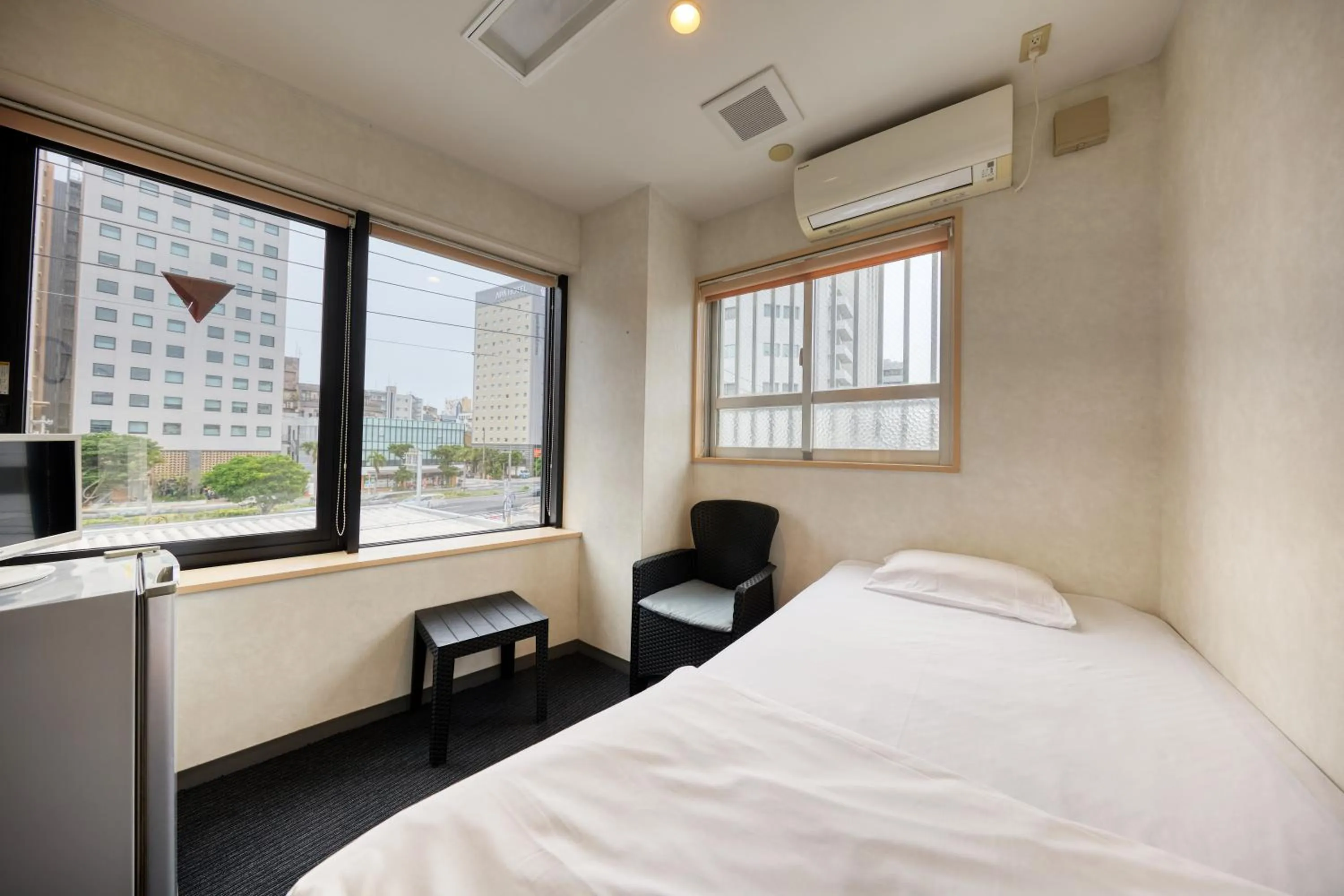 Photo of the whole room in Guest House Grand Naha
