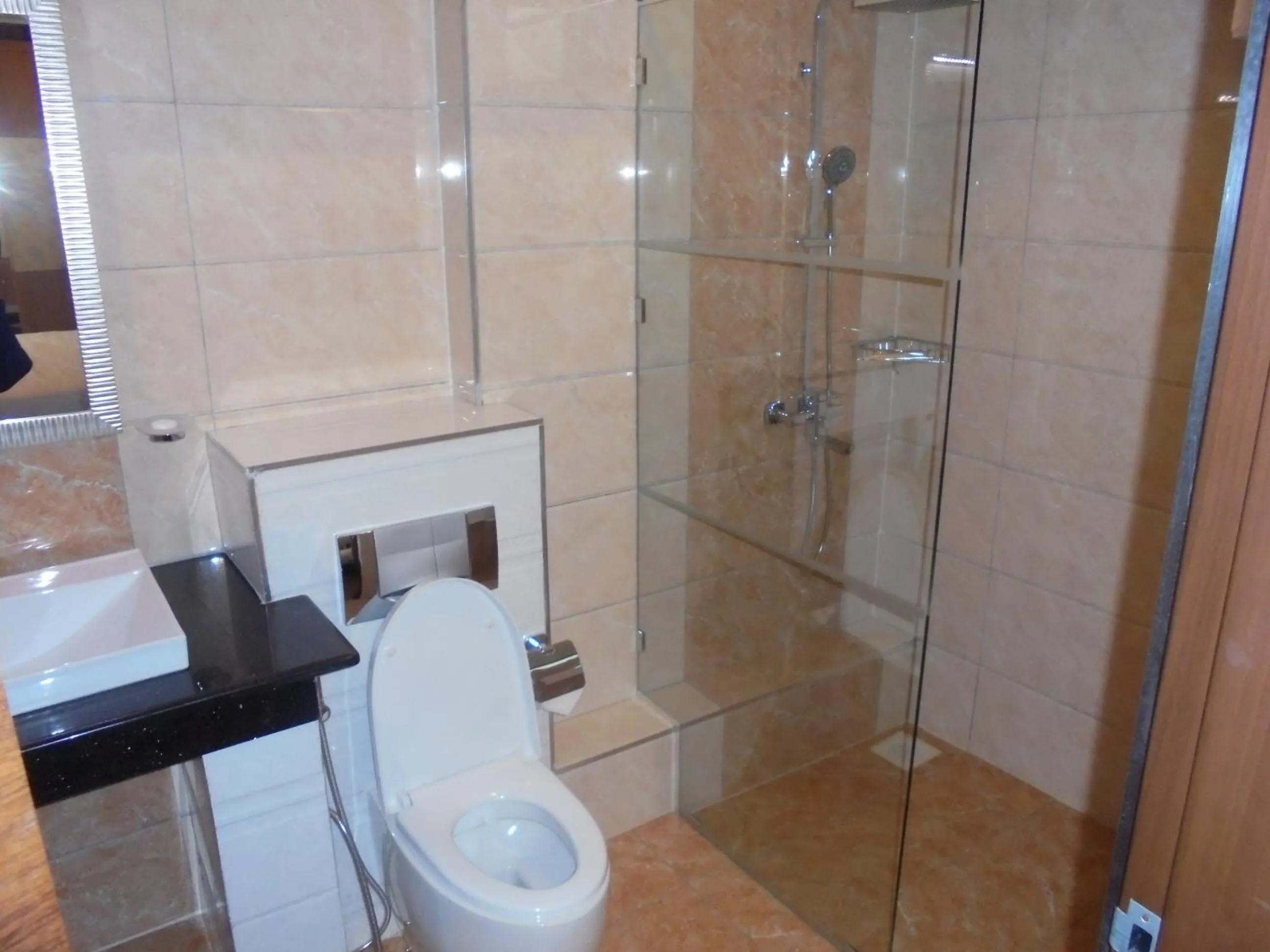 Bathroom in We Hotel and Suites