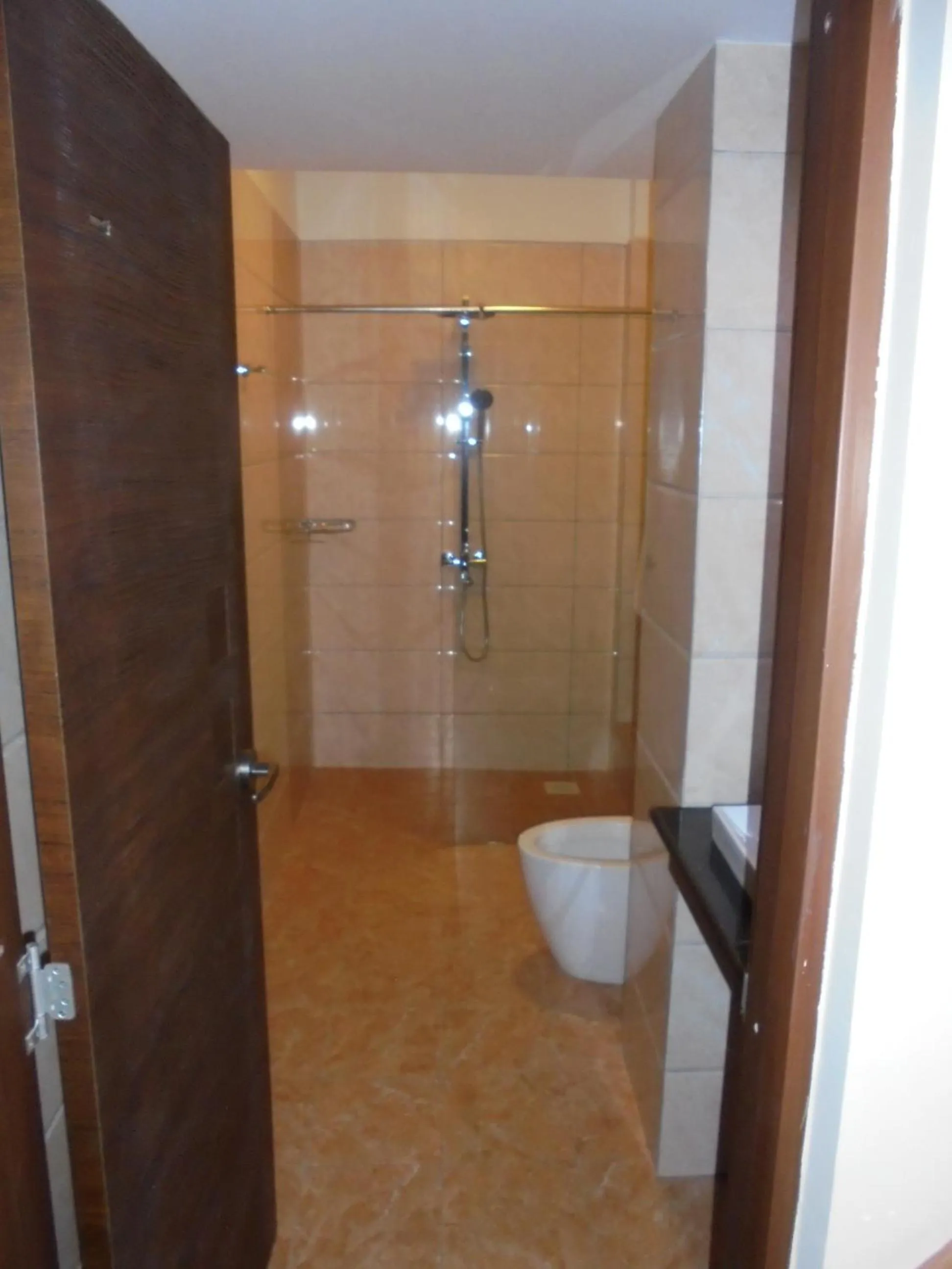 Bathroom in We Hotel and Suites