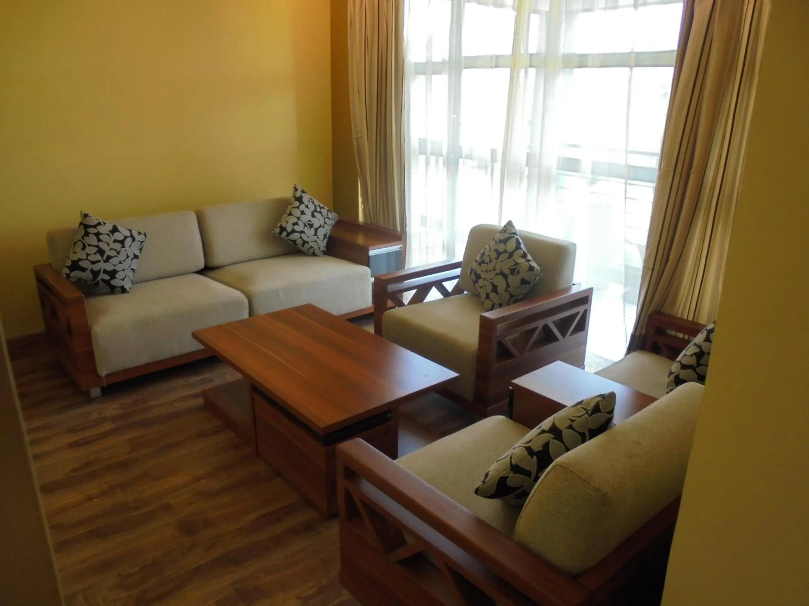 Living room in We Hotel and Suites