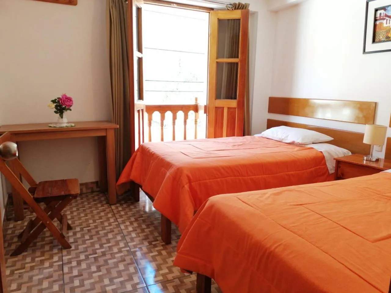 Bed in Tambo de Ollantay Hotel