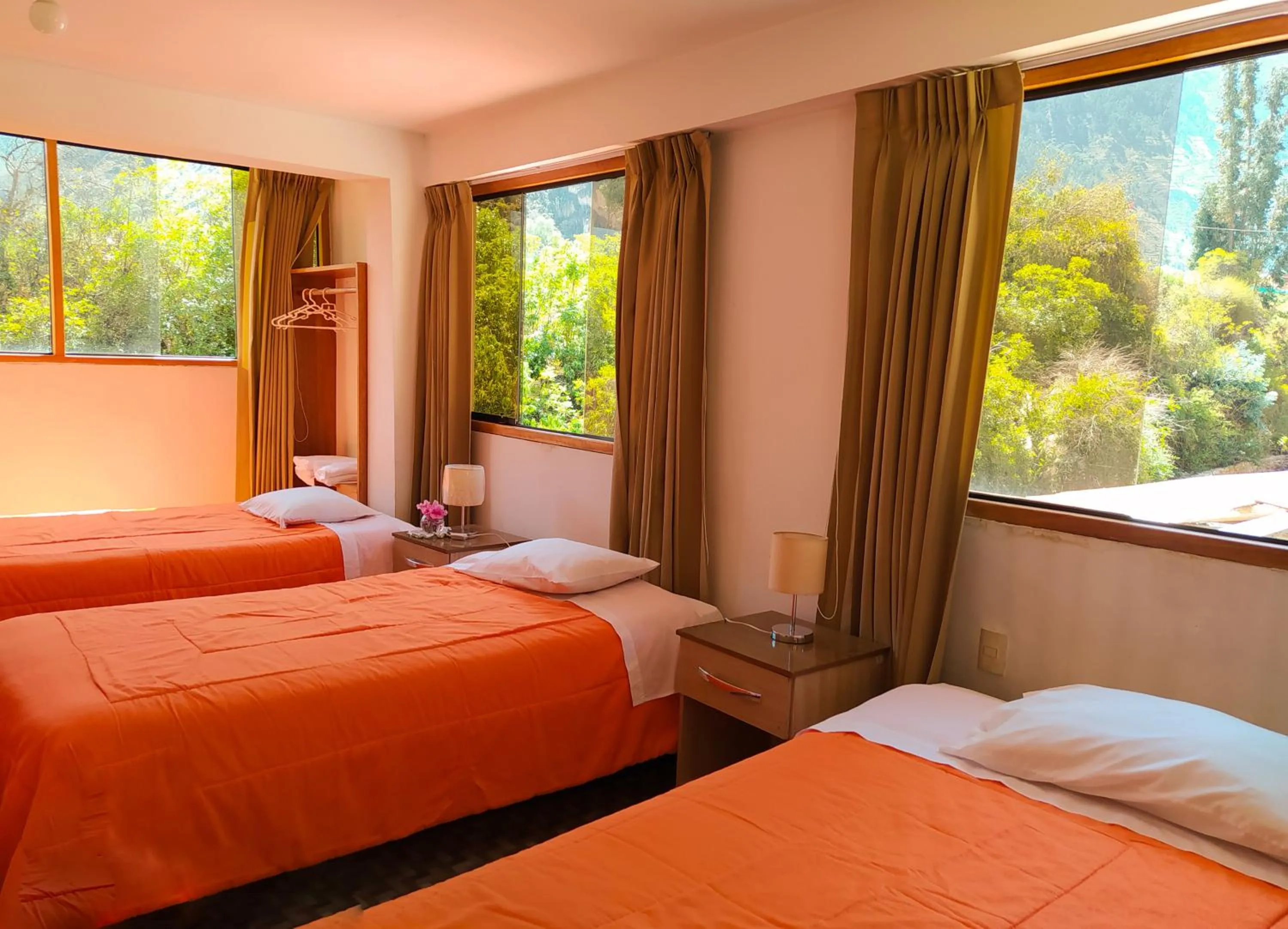 Bed in Tambo de Ollantay Hotel